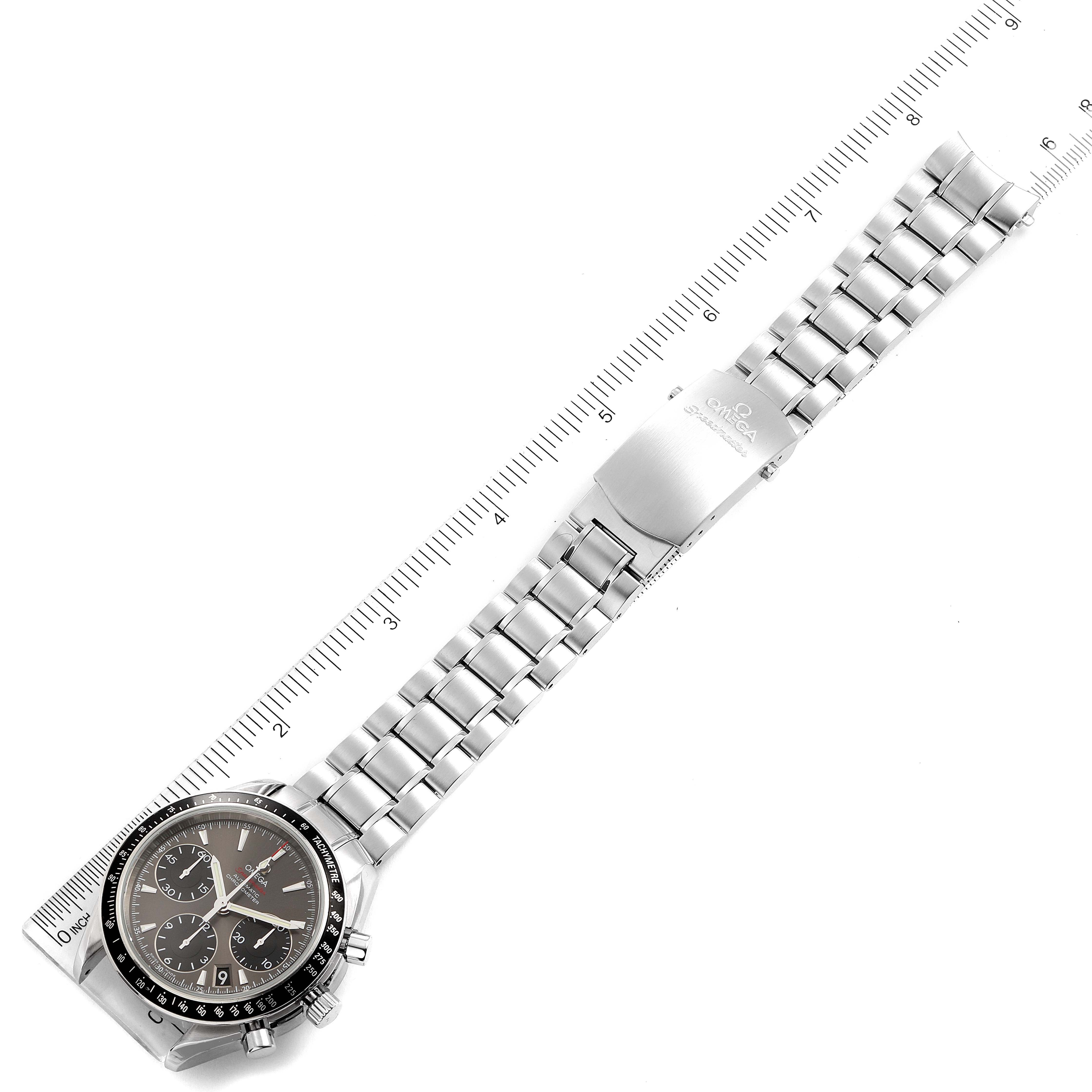 The image shows an Omega Speedmaster 323.30.40.40.06.001 Men's Stainless Steel Grey Dial 323.30.40.40.06.001 Men's Stainless Steel Grey Dial watch laid flat, displaying its face, bezel, and full metal bracelet with clasp.