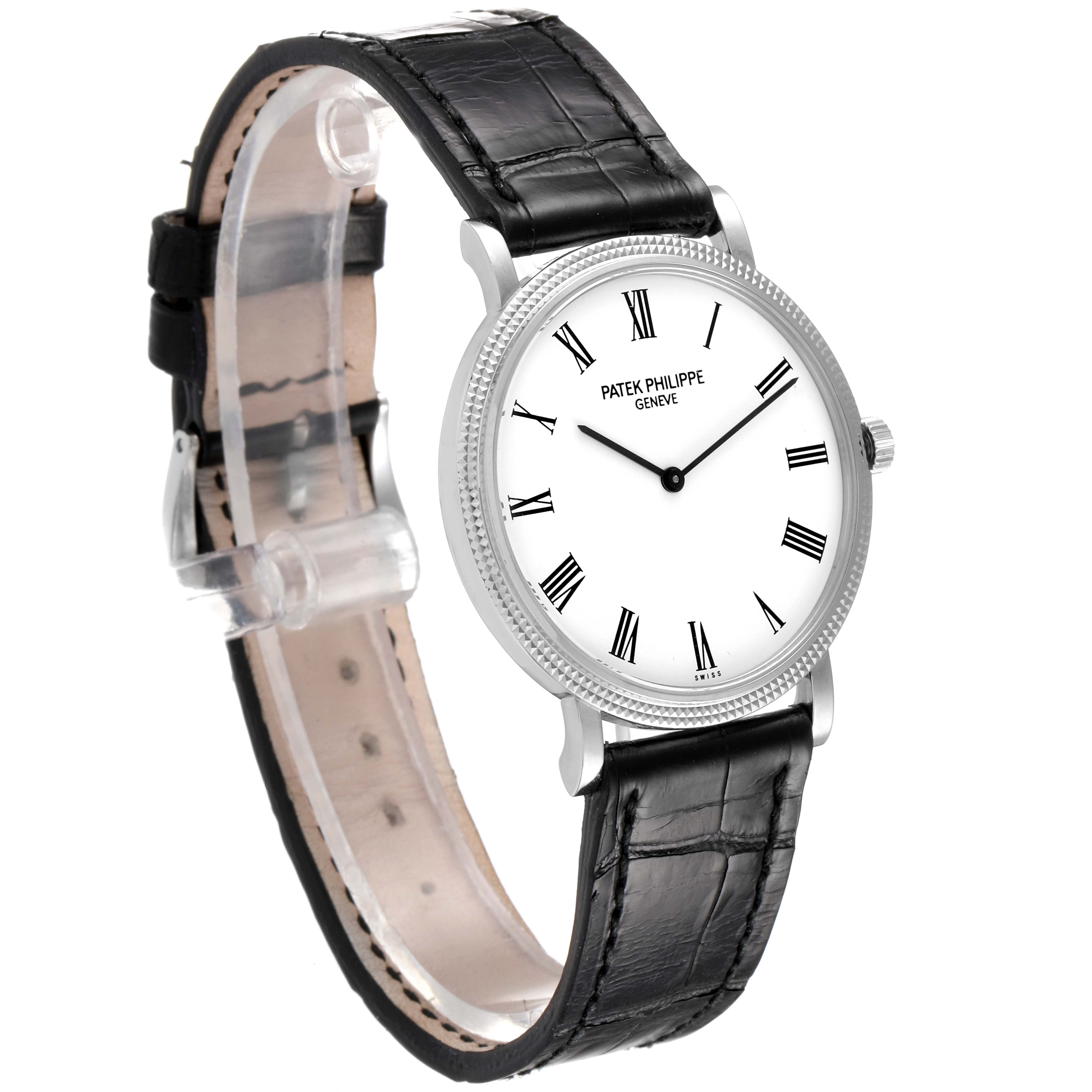 The image shows a side angle of a Patek Philippe Calatrava 5120G Men's White Gold White Dial 5120G Men's White Gold White Dial watch, displaying its face, case, and leather strap.
