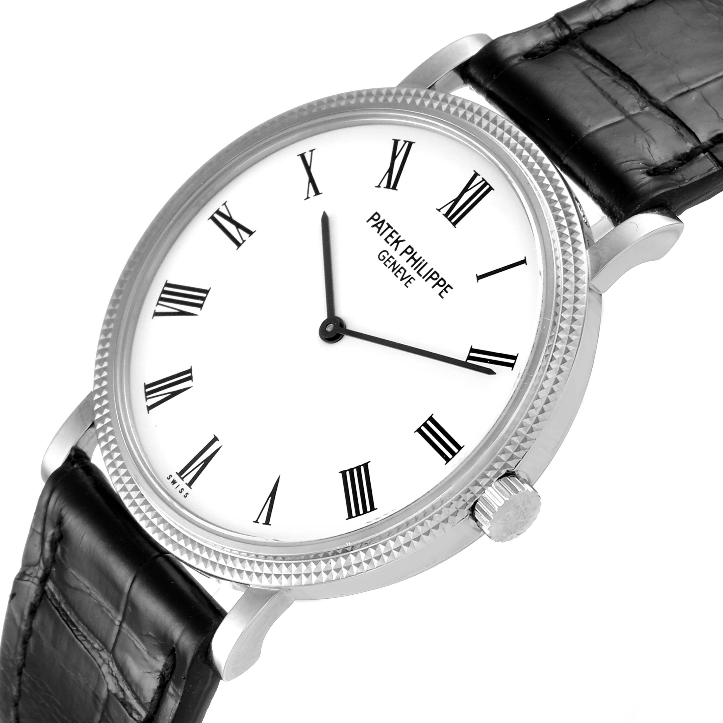 The Patek Philippe Calatrava 5120G Men's White Gold White Dial 5120G Men's White Gold White Dial watch is shown at a slight angle displaying its face, crown, and part of its leather strap.
