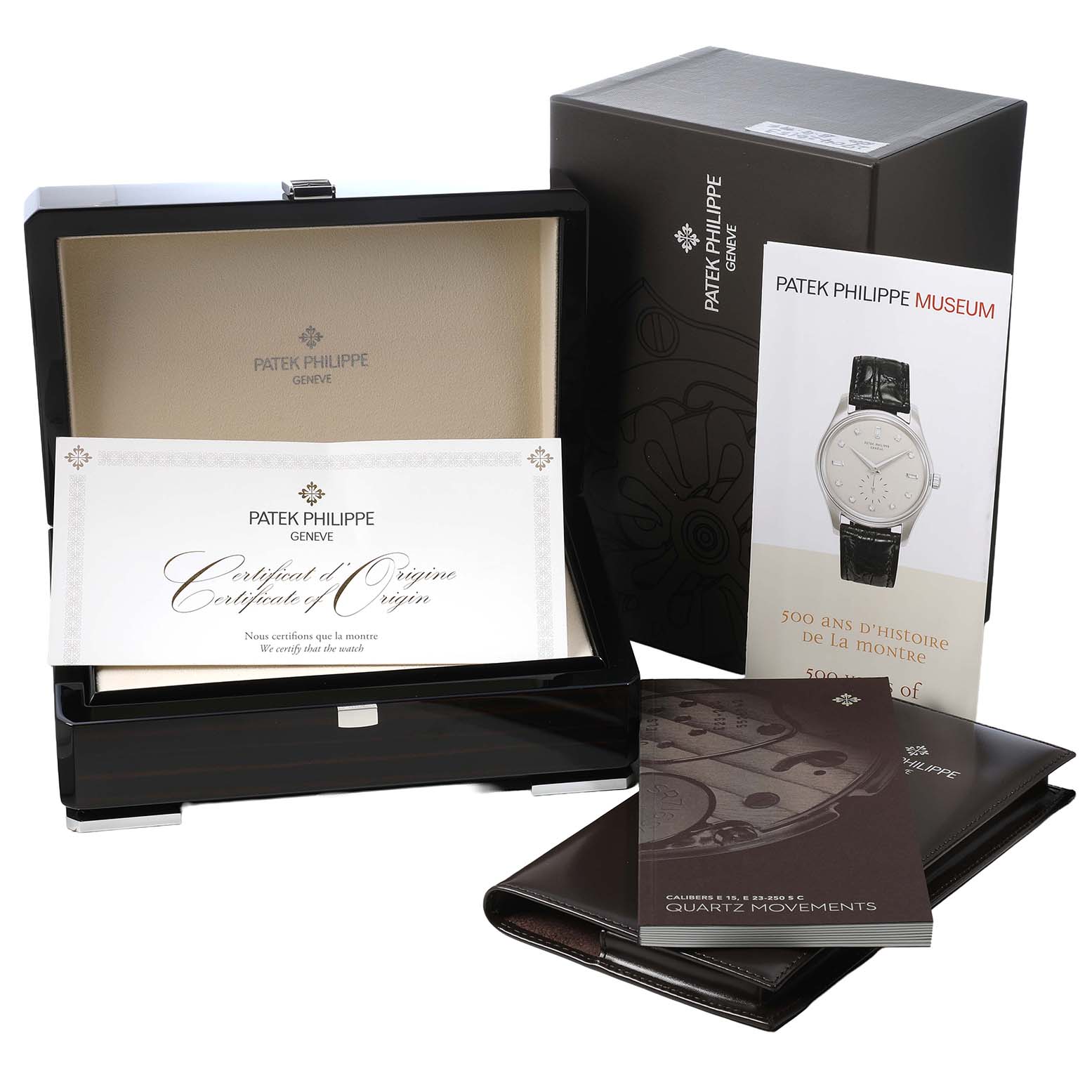 The image shows a Patek Philippe Twenty-4 4910A Women's Stainless Steel Green Dial box, certificate, manuals, and booklets viewed from the front.