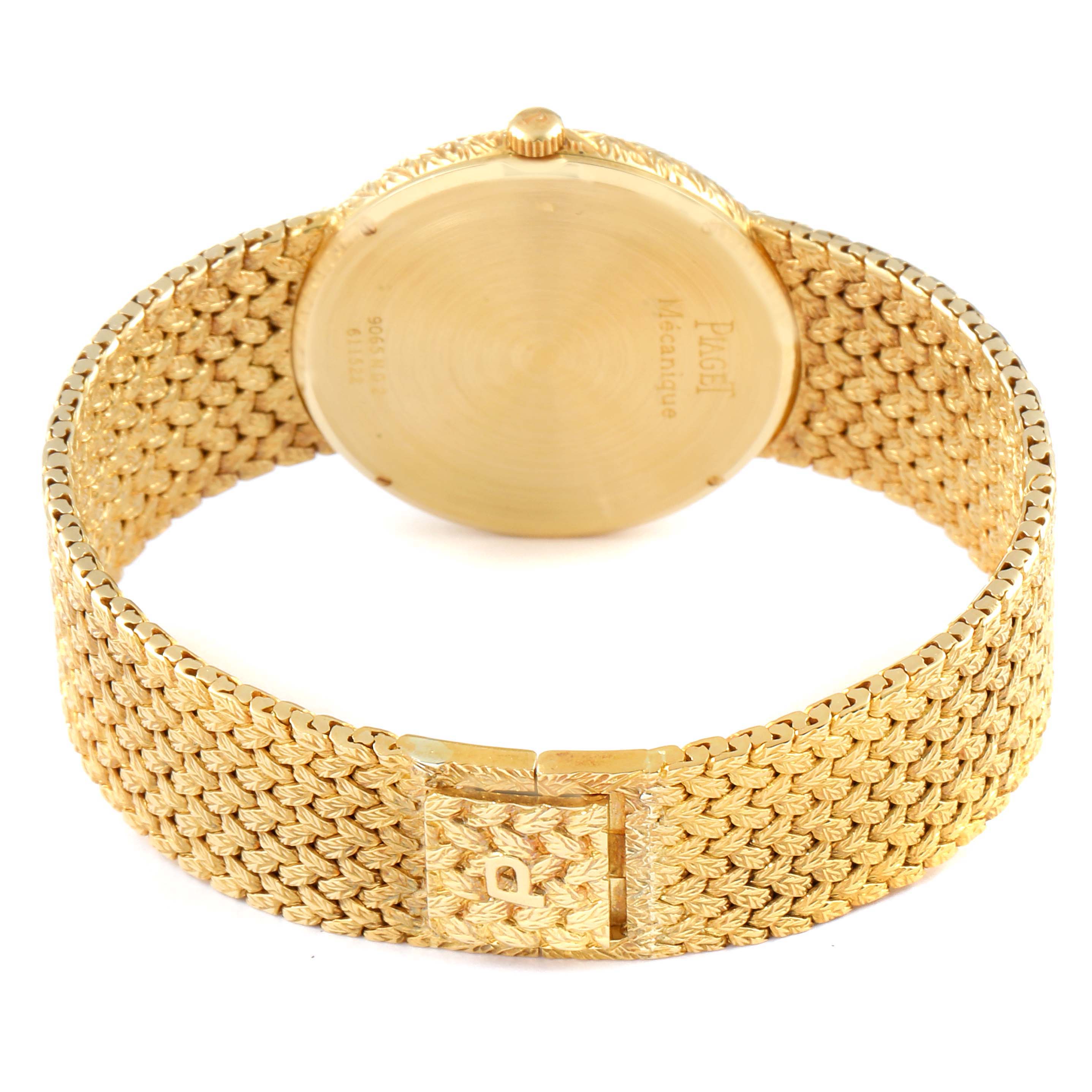 This image shows the back side and woven bracelet of the Piaget 9065 ND 2 Men's Yellow Gold Champagne Dial 9065 ND 2 Men's Yellow Gold Champagne Dial 9065 18k Yellow Gold Champagne Dial Vintage Men's Watch.
