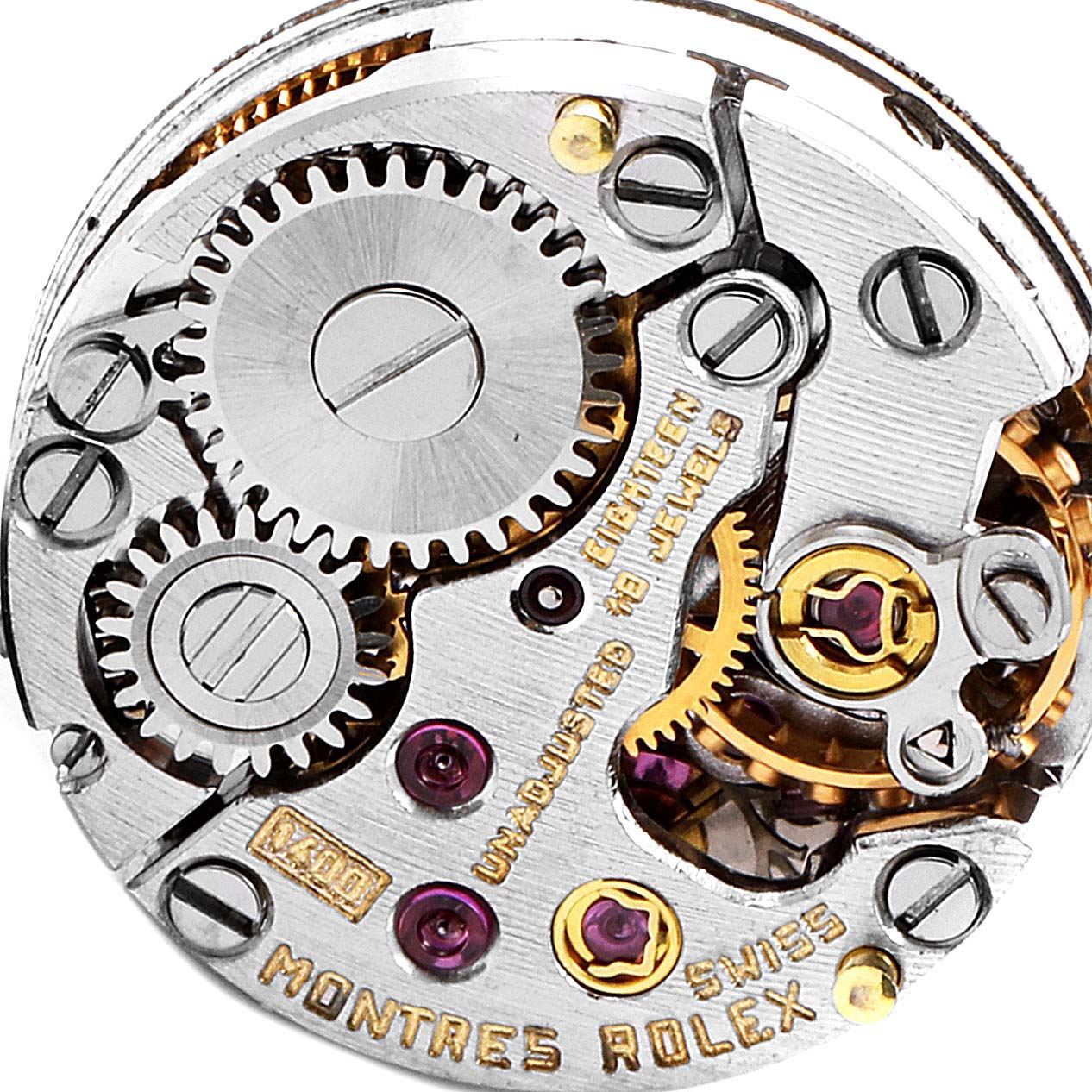 This image shows a close-up of the internal gears and mechanisms of a Rolex Cocktail 32369 Women's Yellow Gold Silver Dial 32369 Women's Yellow Gold Silver Dial model watch.