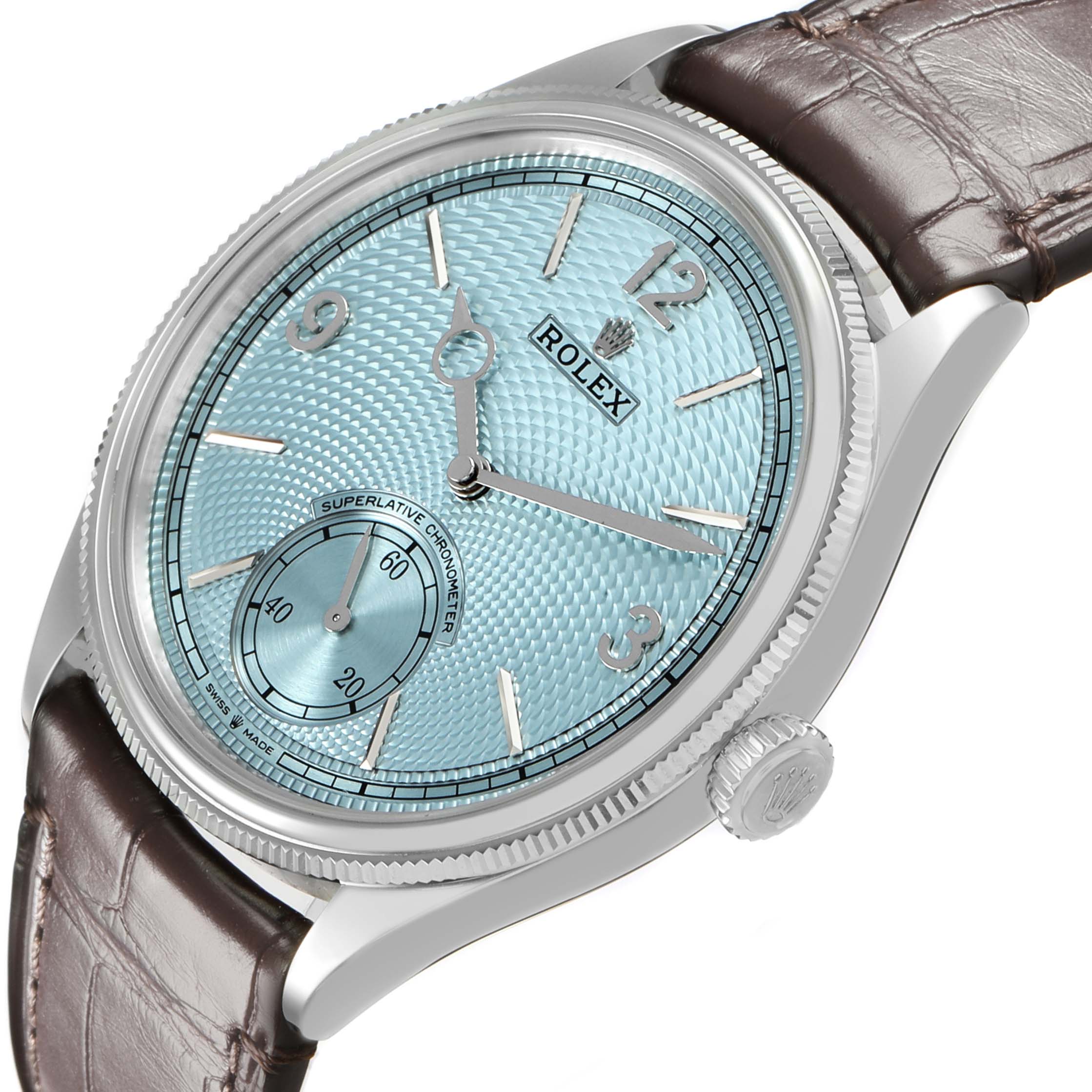 The Rolex 1908 52506 Men's Platinum Blue Dial watch is shown at an angled view, highlighting the dial, bezel, crown, and strap.