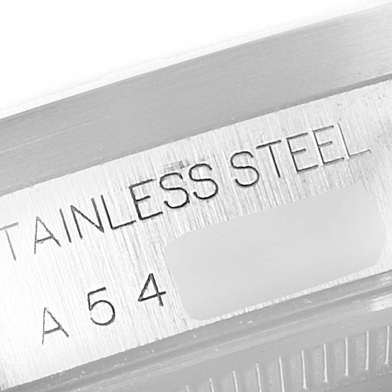 This image shows a close-up of the side engraving on a Rolex Air-King 14010 Men's Stainless Steel Blue Dial 14010 Men's Stainless Steel Blue Dial watch, specifying "STAINLESS STEEL" and a partially visible serial number.