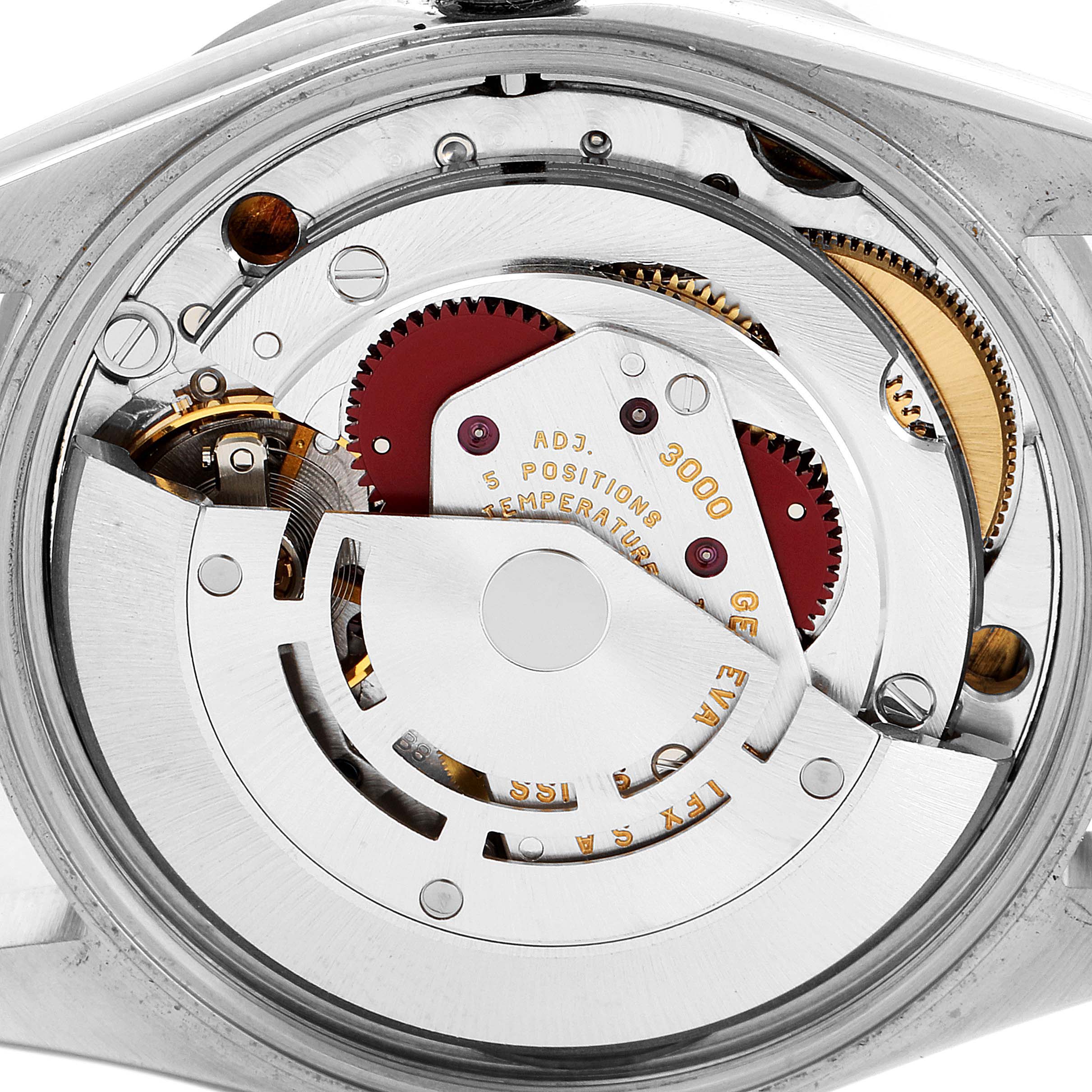 The image shows an internal view of the Rolex Air-King 14010 Men's Stainless Steel Blue Dial 14010 Men's Stainless Steel Blue Dial watch, focusing on its intricate mechanical movement.