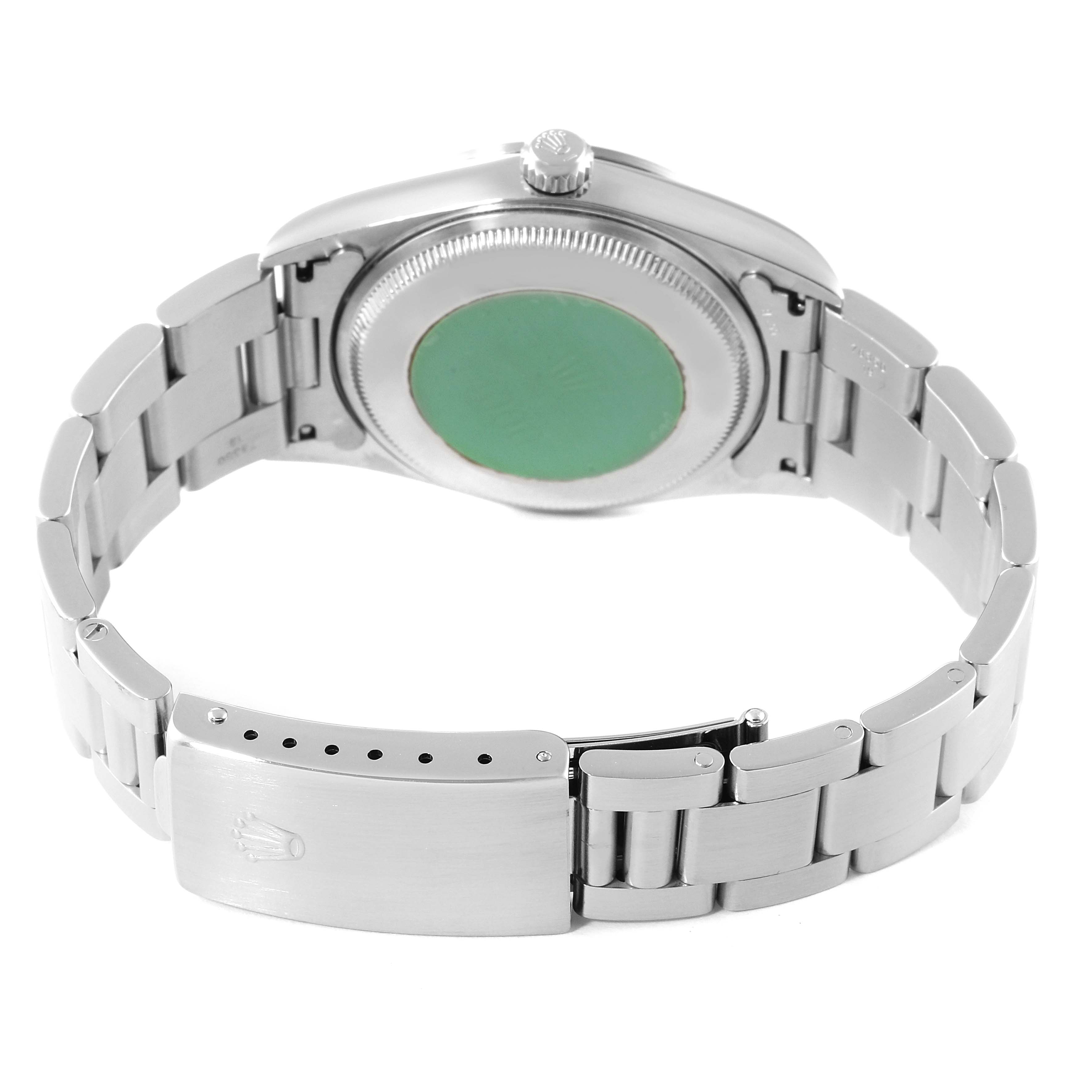 The image shows the back case and the bracelet of a Rolex Air-King 14000 Men's Stainless Steel Silver Dial 14000 Men's Stainless Steel Silver Dial watch.