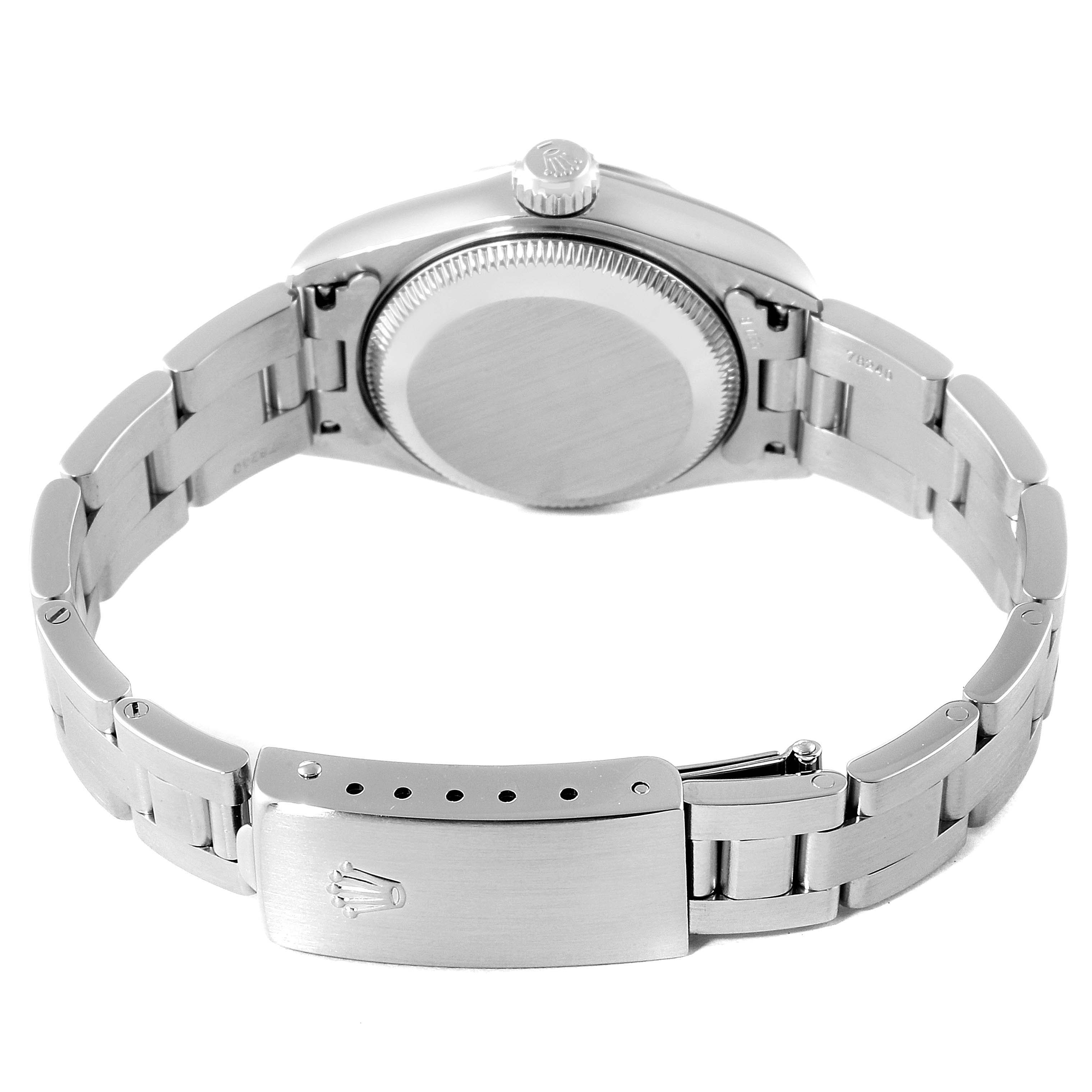 This image shows the back view of a Rolex Date 79190 Women's Stainless Steel Black Dial 79190 Women's Stainless Steel Black Dial model watch, highlighting its case back, crown, and metal bracelet clasp.