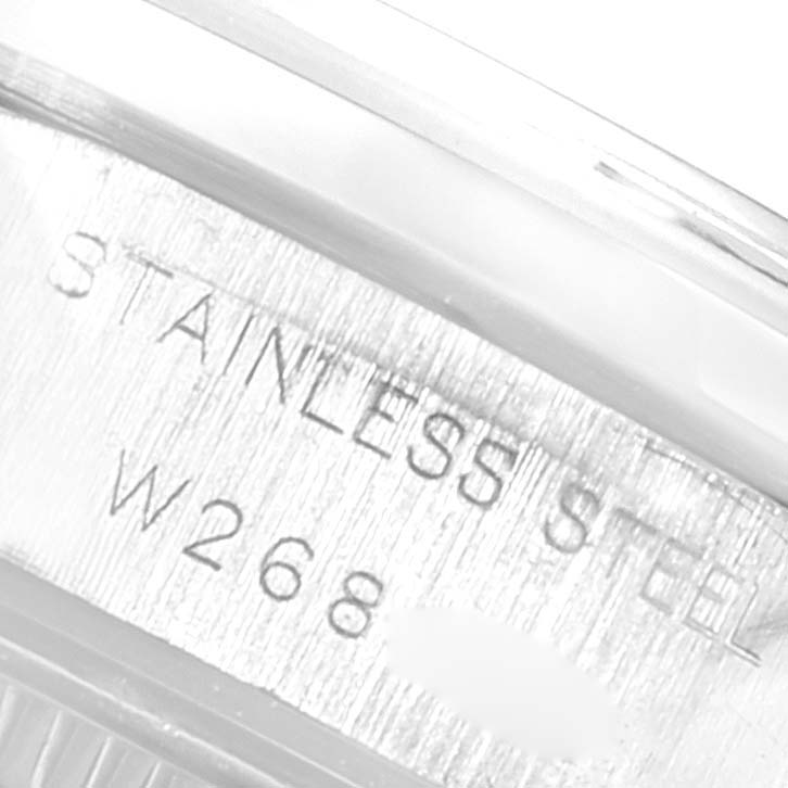 The image shows a close-up angle of the case side engraving on a stainless steel Rolex Date 69160 Women's Stainless Steel Black Dial 69160 Women's Stainless Steel Black Dial model.
