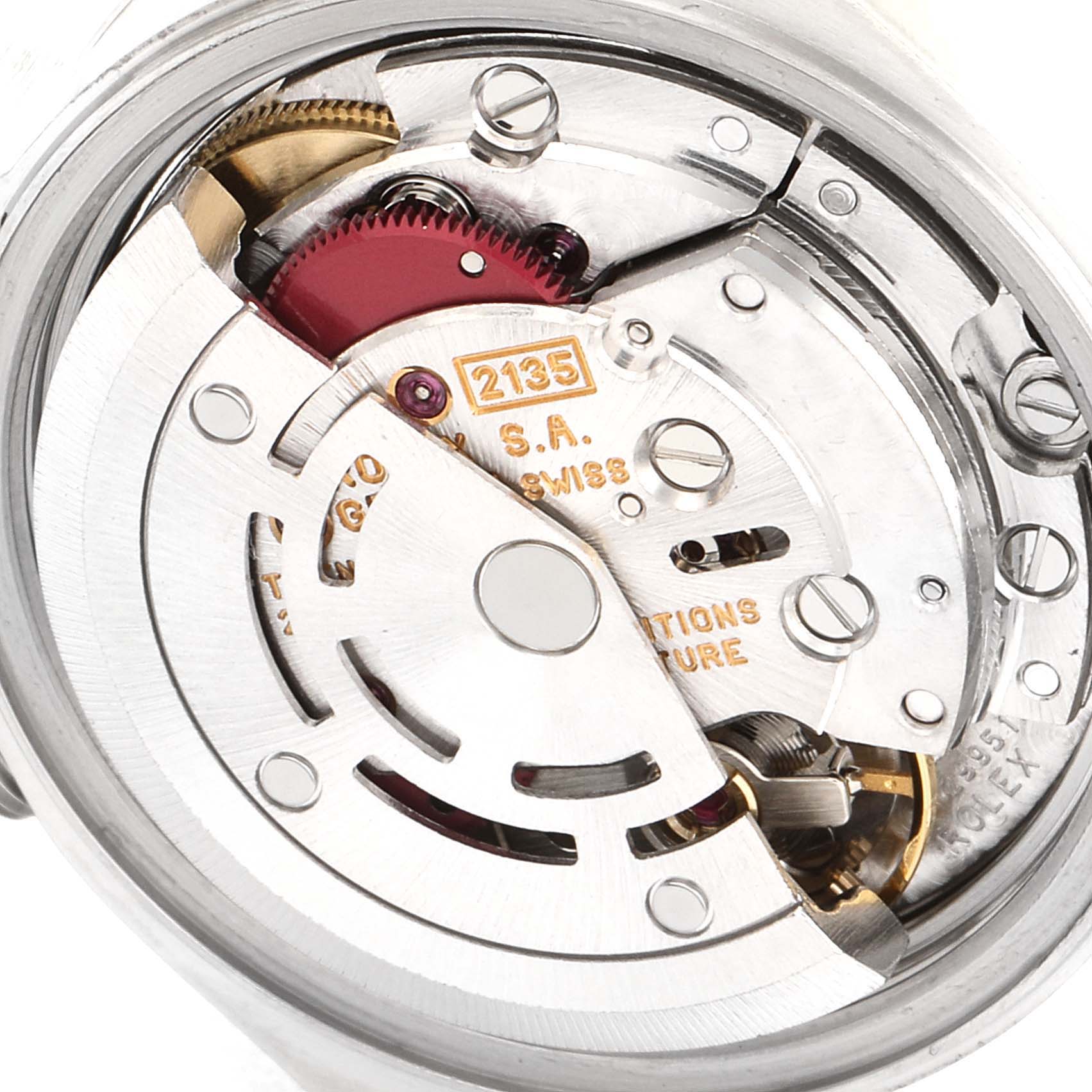 This image shows the internal mechanism of the Rolex Date 69160 Women's Stainless Steel Black Dial 69160 Women's Stainless Steel Black Dial model watch, featuring its intricate gears and components.