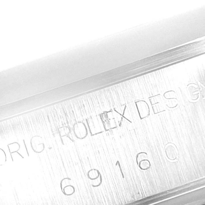 This image shows an engraved side view of the case for the Rolex Date 69160 Women's Stainless Steel Black Dial 69160 Women's Stainless Steel Black Dial model, showcasing the design number.