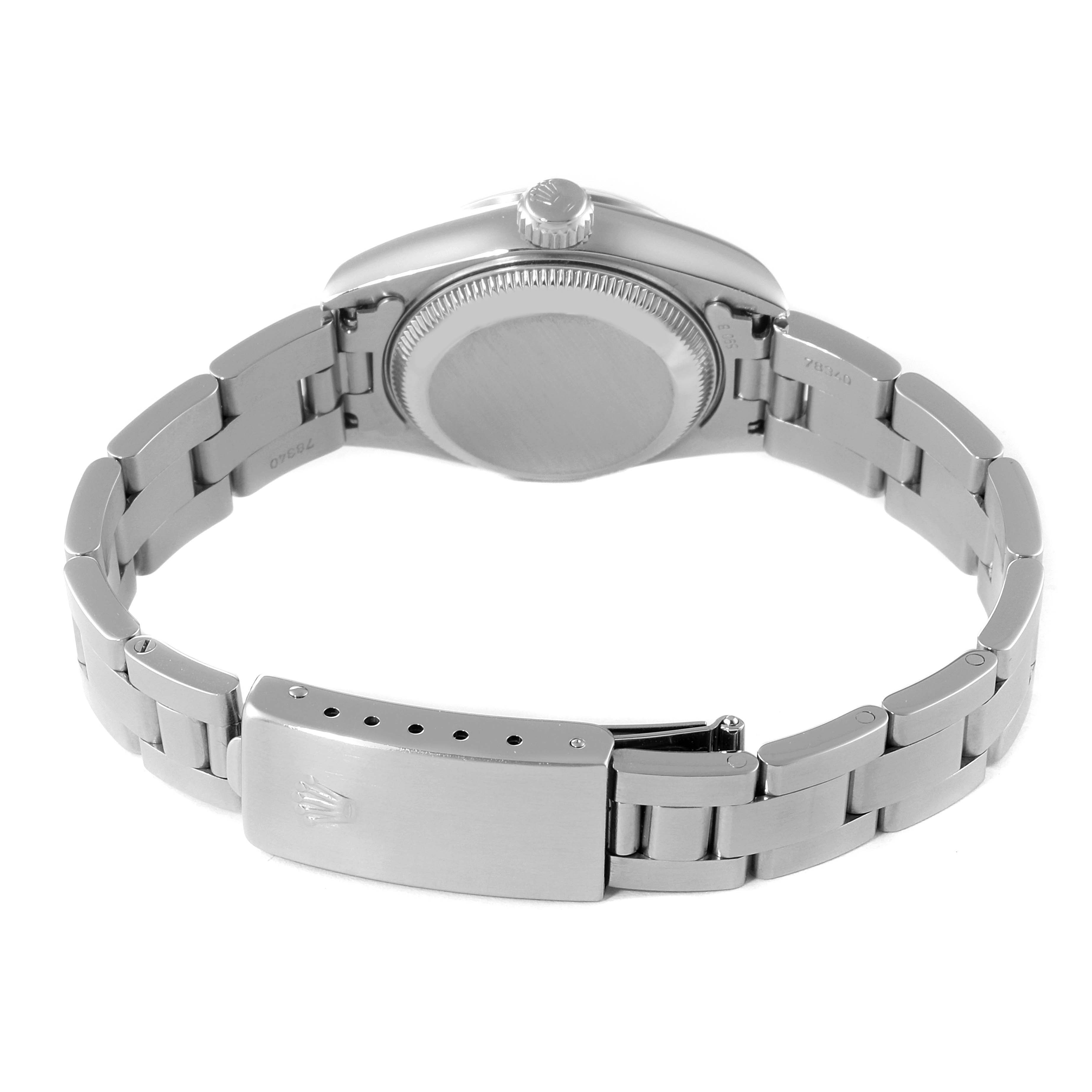 This image shows the back view of a Rolex Date 69160 Women's Stainless Steel Blue Dial 69160 Women's Stainless Steel Blue Dial watch, highlighting its case back, crown, and bracelet clasp.