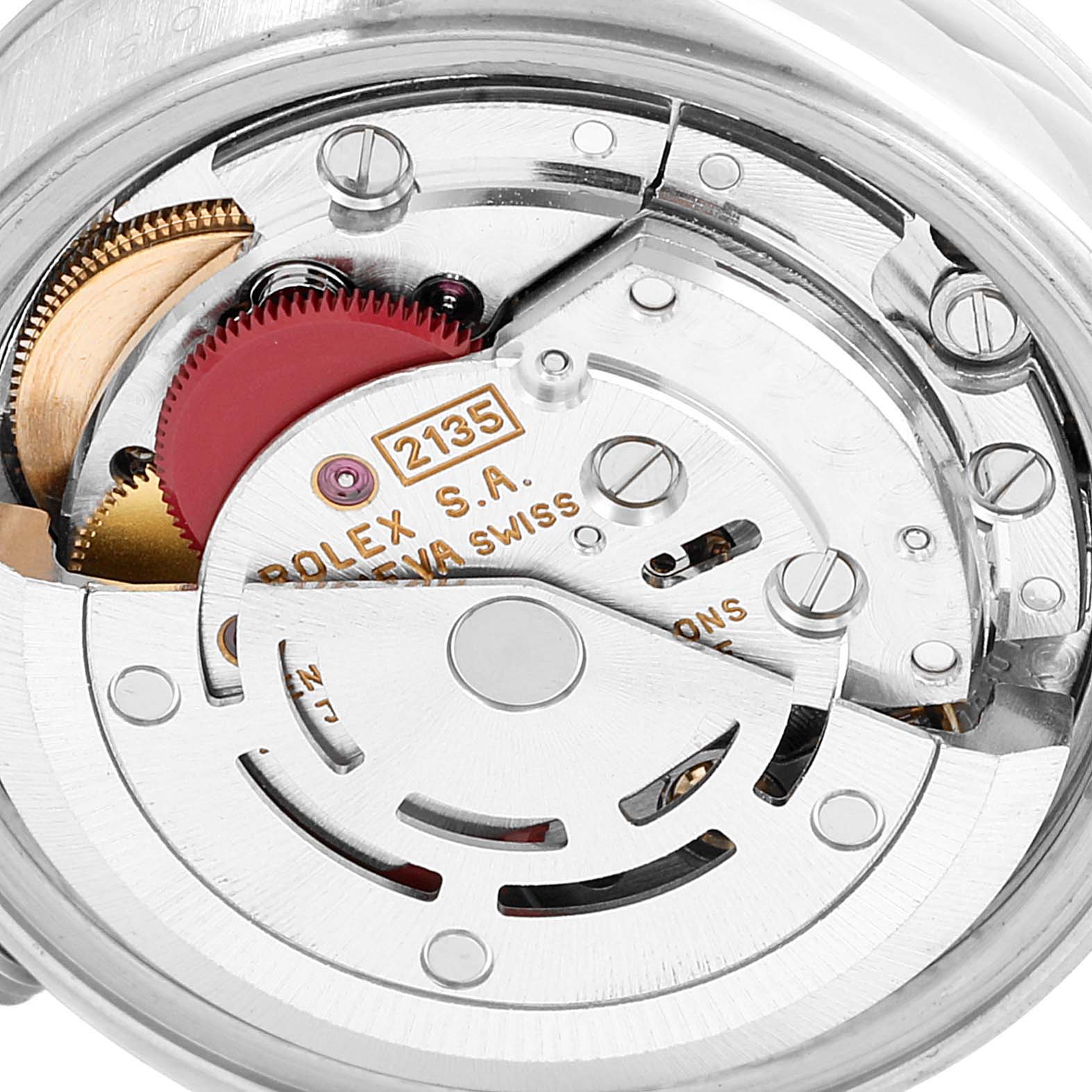 This image shows a close-up view of the movement mechanism of a Rolex Date 69160 Women's Stainless Steel Blue Dial 69160 Women's Stainless Steel Blue Dial model watch.