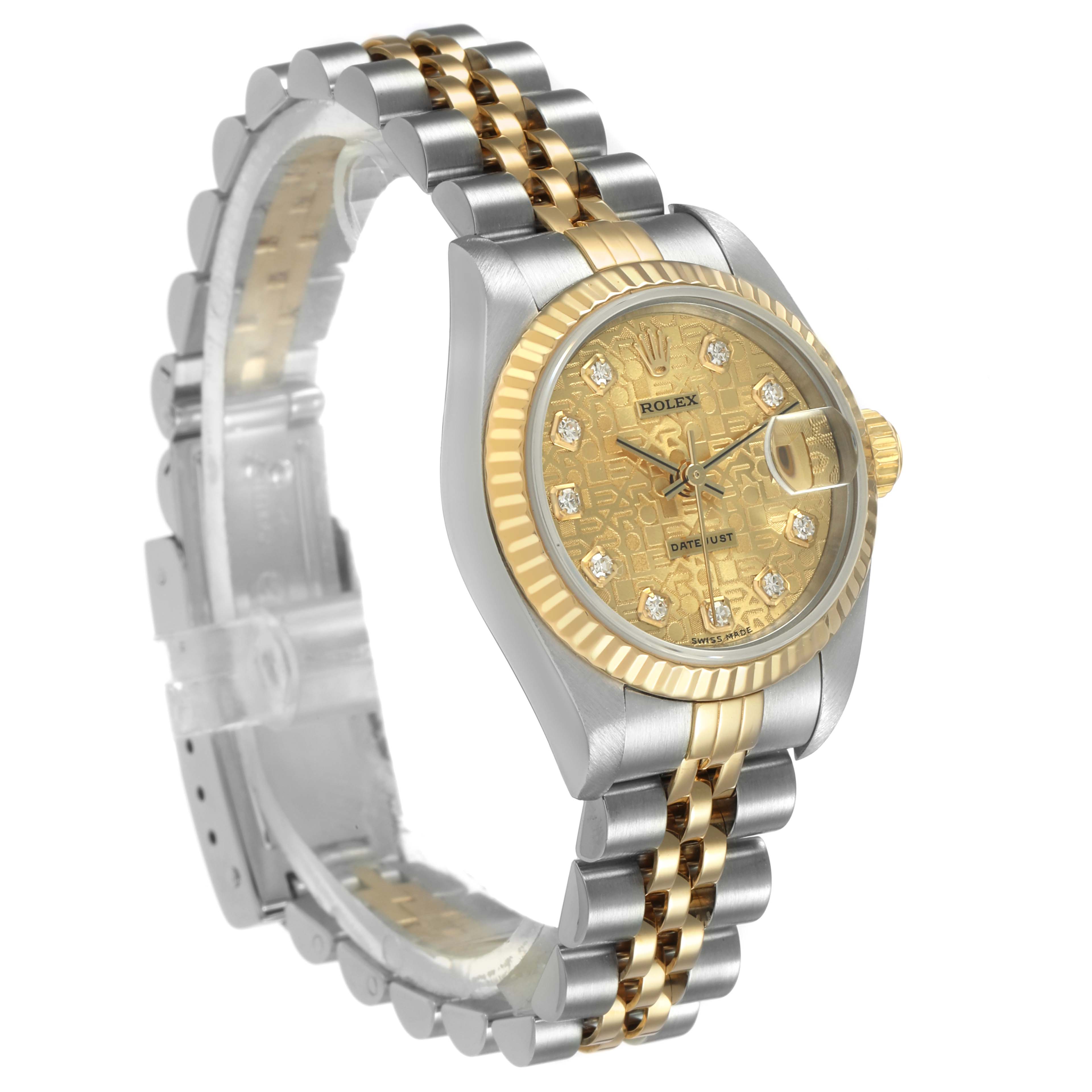 The Rolex Datejust 69173 Women's Steel and Gold (two tone) Champagne Dial watch is shown at a three-quarter angle, highlighting the gold and silver bracelet, bezel, and diamond-accented dial.