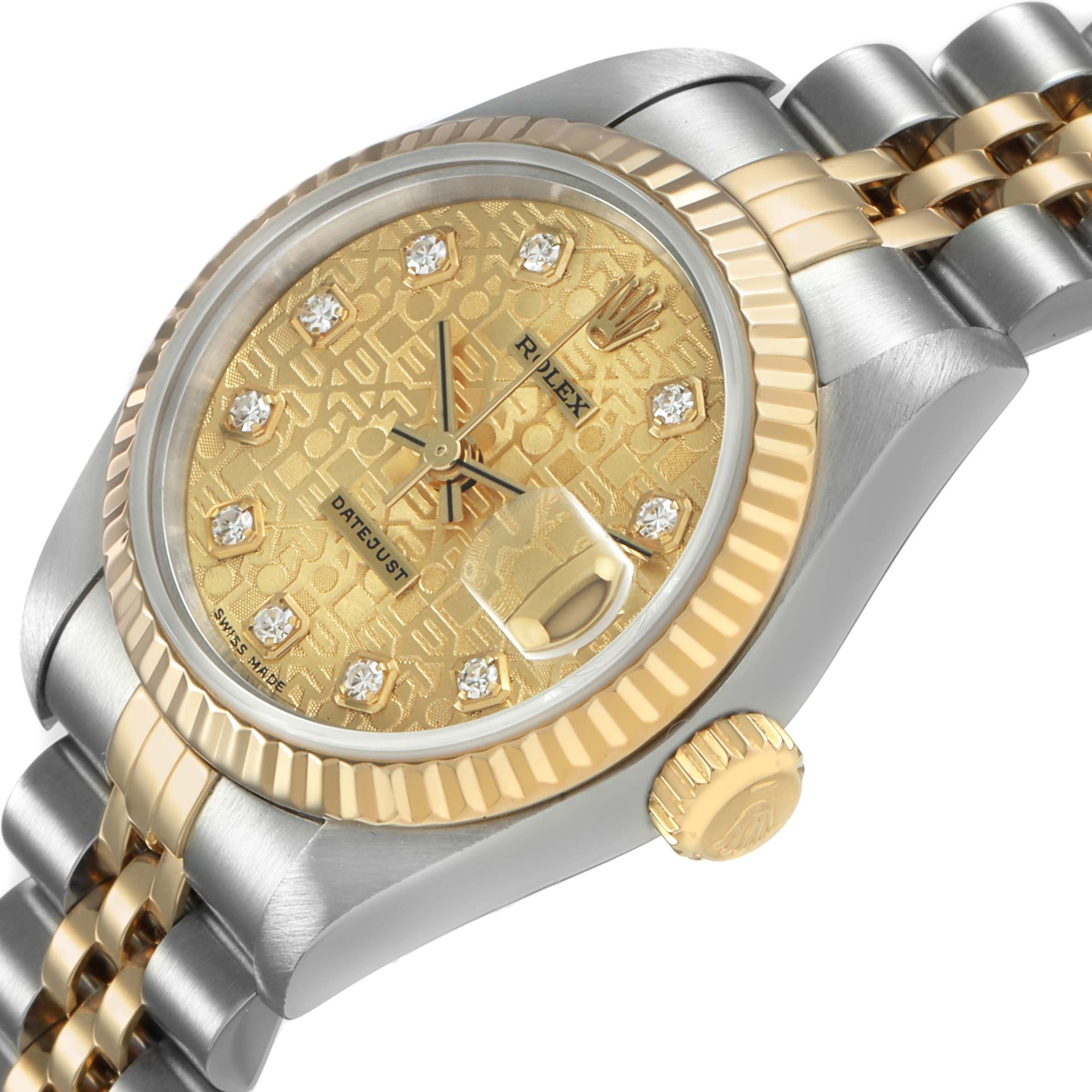 The Rolex Datejust 69173 Women's Steel and Gold (two tone) Champagne Dial watch is shown from a three-quarter angle, highlighting the dial, bezel, crown, and part of the bracelet.