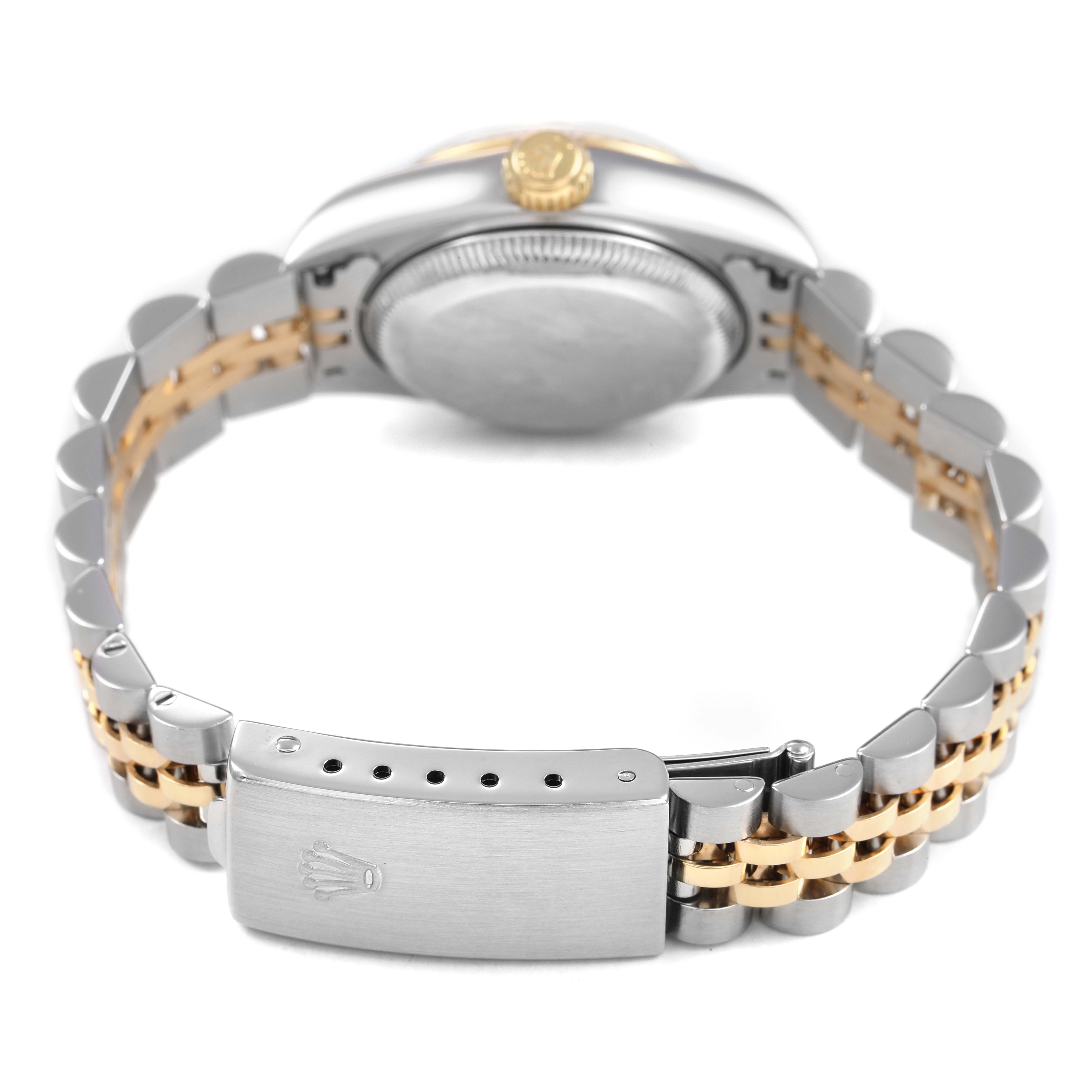 The Rolex Datejust 69173 Women's Steel and Gold (two tone) Champagne Dial watch is shown from the back, highlighting the case back, crown, and two-tone bracelet.