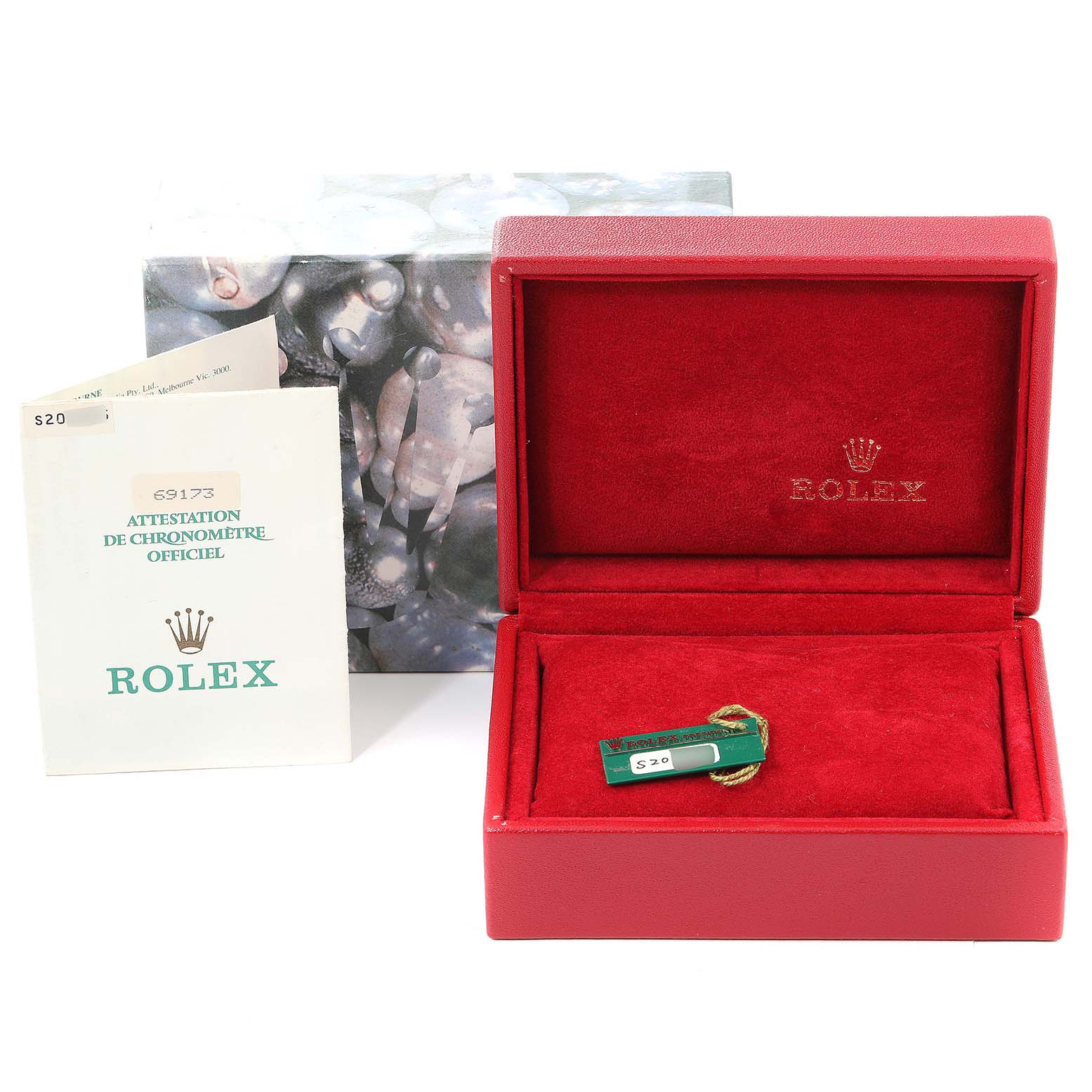 The image displays an open Rolex Datejust 69173 Women
s Steel and Gold (two tone) Champagne Dial 69173 Women
s Steel and Gold (two tone) Champagne Dial watch box, accompanying papers, and a tag.
