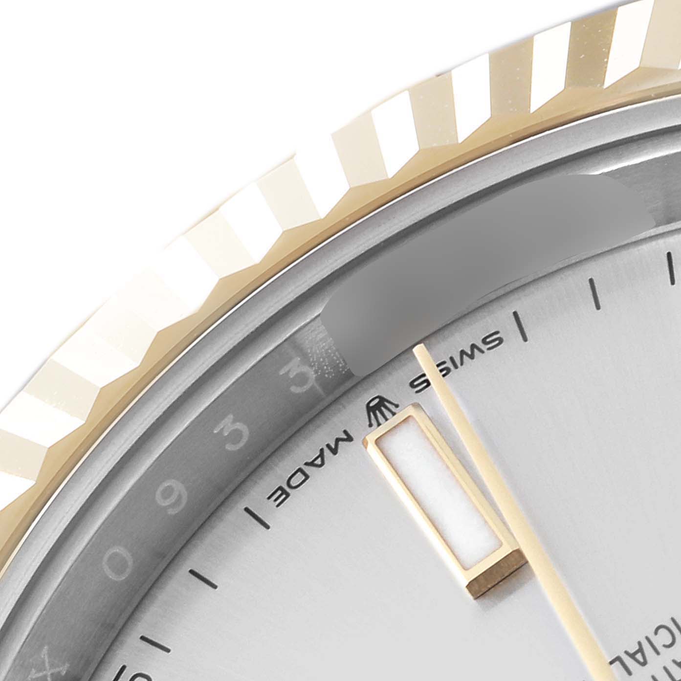 The image shows a close-up of the bezel, part of the dial, and the "Swiss Made" text of the Rolex Datejust 41 126333 Men's Steel and Gold (two tone) Silver Dial 126333 Men's Steel and Gold (two tone) Silver Dial watch.