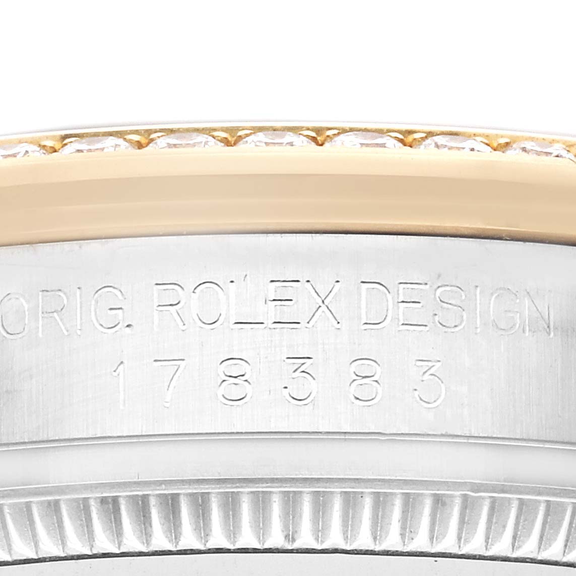 The image shows a close-up of the side of a Mid-Size Rolex watch, highlighting the bezel and part of the "ORIG. ROLEX DESIGN" engraving with model number 178383.