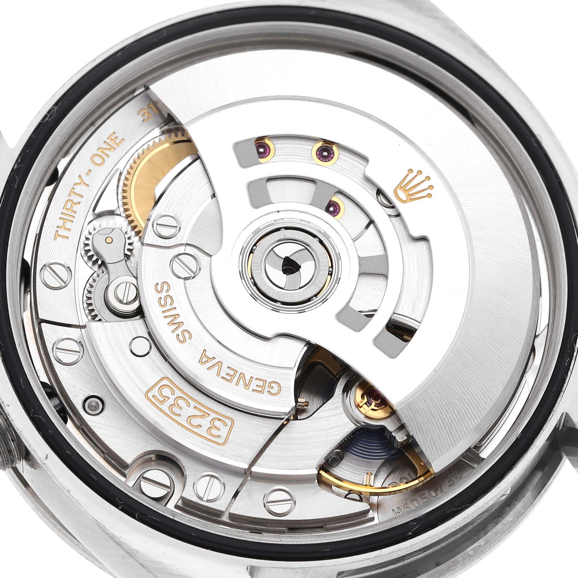 The image shows the movement of a Rolex Datejust 126284 Men's Stainless Steel Silver Dial 126284 Men's Stainless Steel Silver Dial watch from a top-down angle, highlighting the rotor and internal mechanisms.