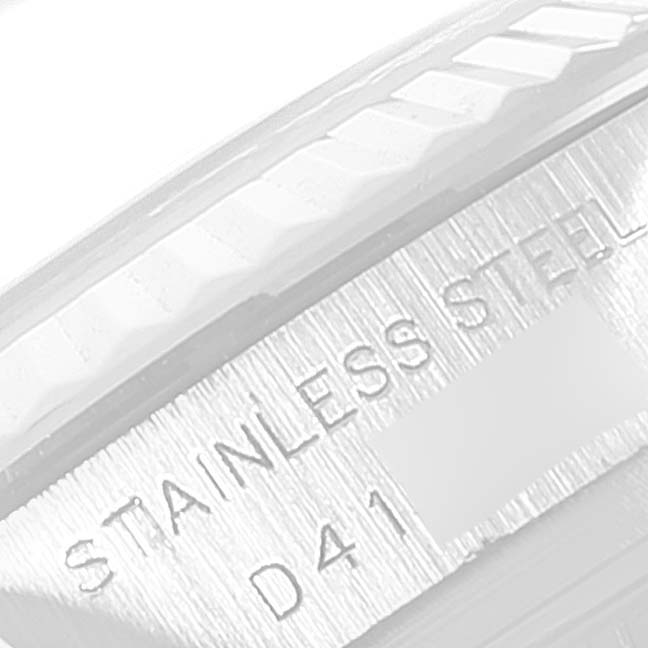 This image shows a close-up angle of the side of a Rolex Datejust 179174 Women's Stainless Steel Mother of Pearl Dial 179174 Women's Stainless Steel Mother of Pearl Dial watch case with "STAINLESS STEEL" and "D41" engraved.