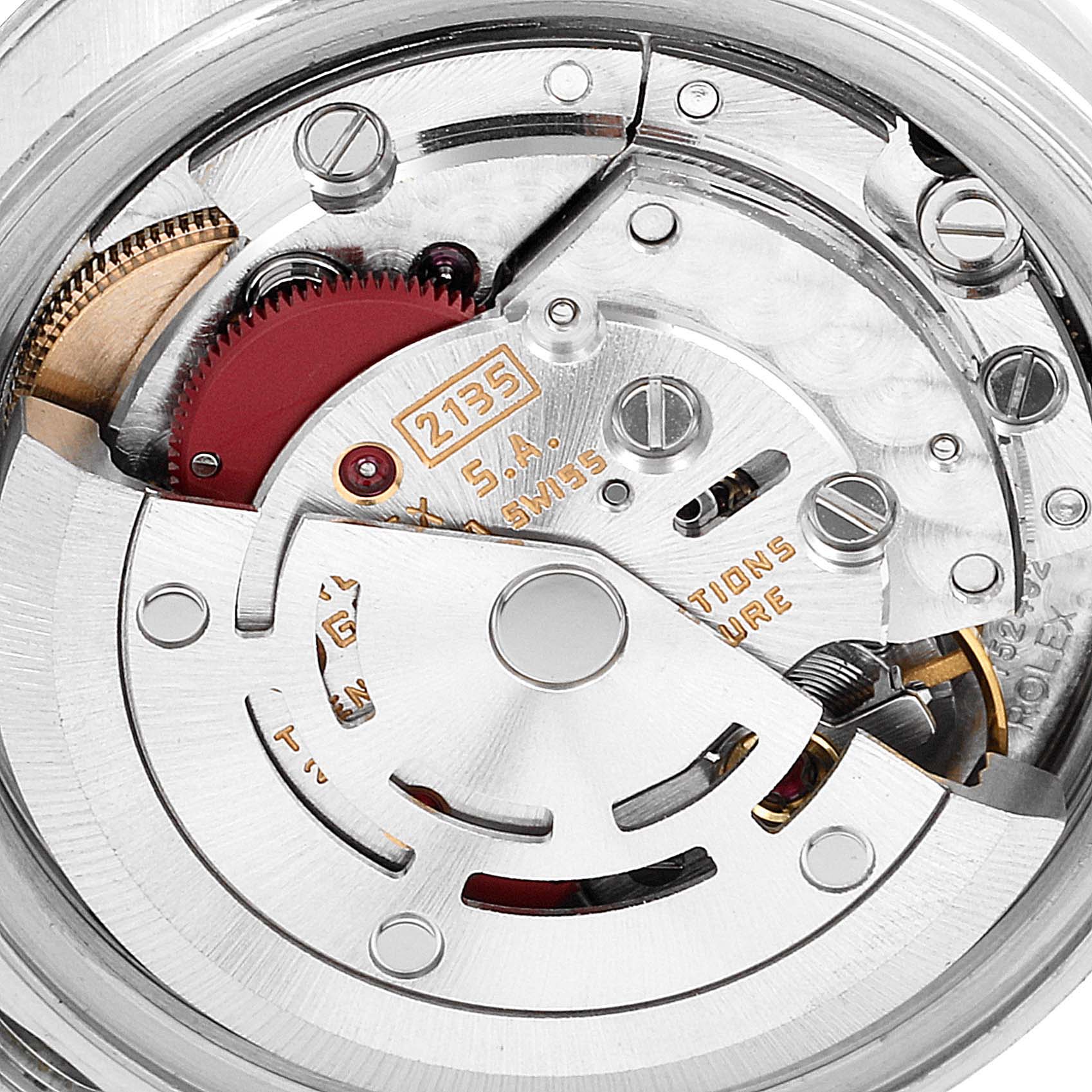 This image shows a close-up of the movement and inner workings of a Rolex Datejust 69174 Women
s Stainless Steel Silver Dial 69174 Women
s Stainless Steel Silver Dial watch.