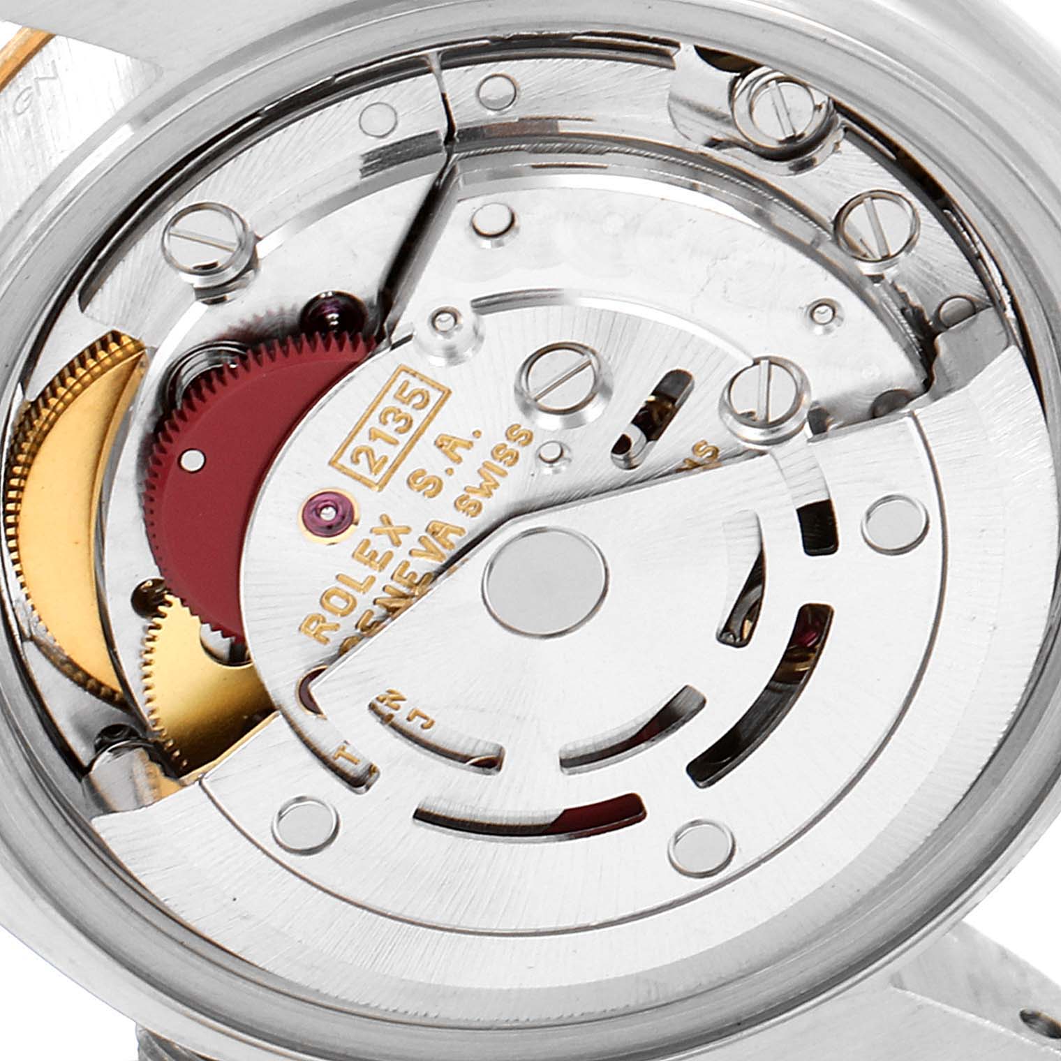 This image shows the intricate internal mechanism of a Rolex Datejust 69173 Women
s Steel and Gold (two tone) Champagne Dial 69173 Women
s Steel and Gold (two tone) Champagne Dial watch, highlighting its movement components.