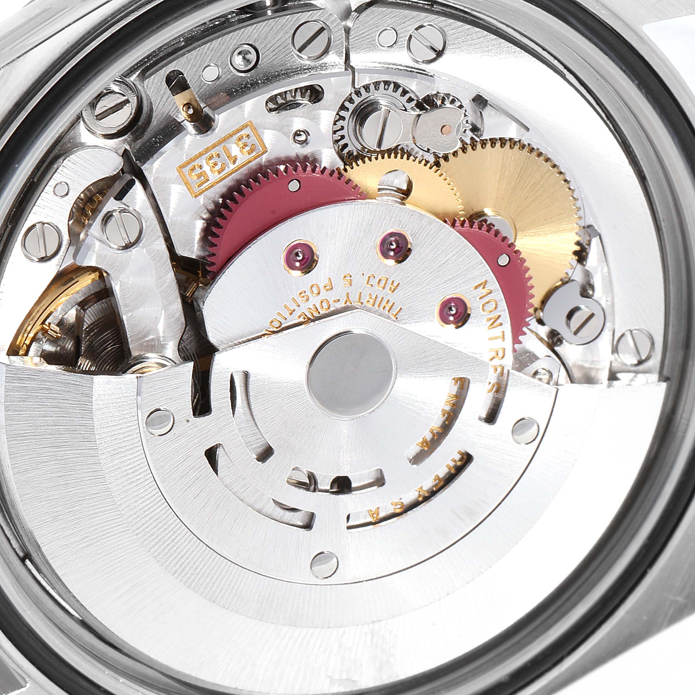 This image shows a close-up of the movement and internal mechanisms of a Rolex Datejust 16233 Men
s Steel and Gold (two tone) Mother of Pearl Dial 16233 Men
s Steel and Gold (two tone) Mother of Pearl Dial watch.
