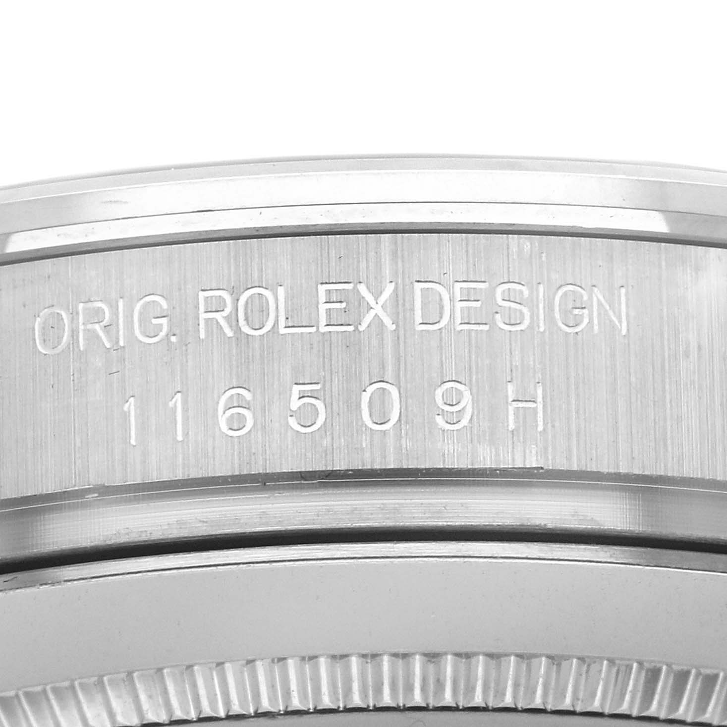 The image shows a close-up of the bezel edge and engraved serial number on the Rolex Daytona 116509 Men
s White Gold Silver Dial 116509 Men
s White Gold Silver Dial watch case.