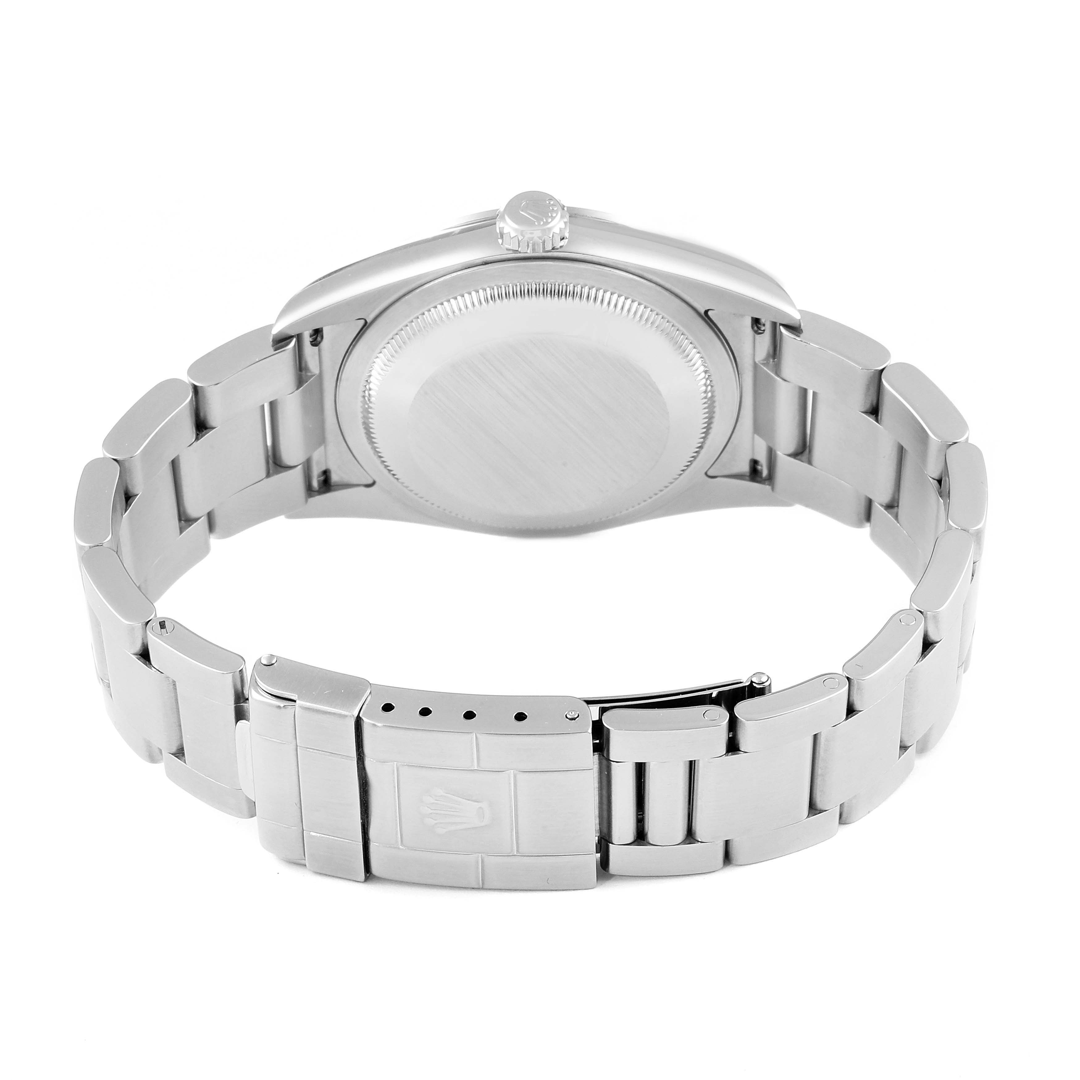 The image shows the back case and clasp of the Rolex Explorer 114270 Men
s Stainless Steel Black Dial 114270 Men
s Stainless Steel Black Dial watch at a slightly tilted angle.