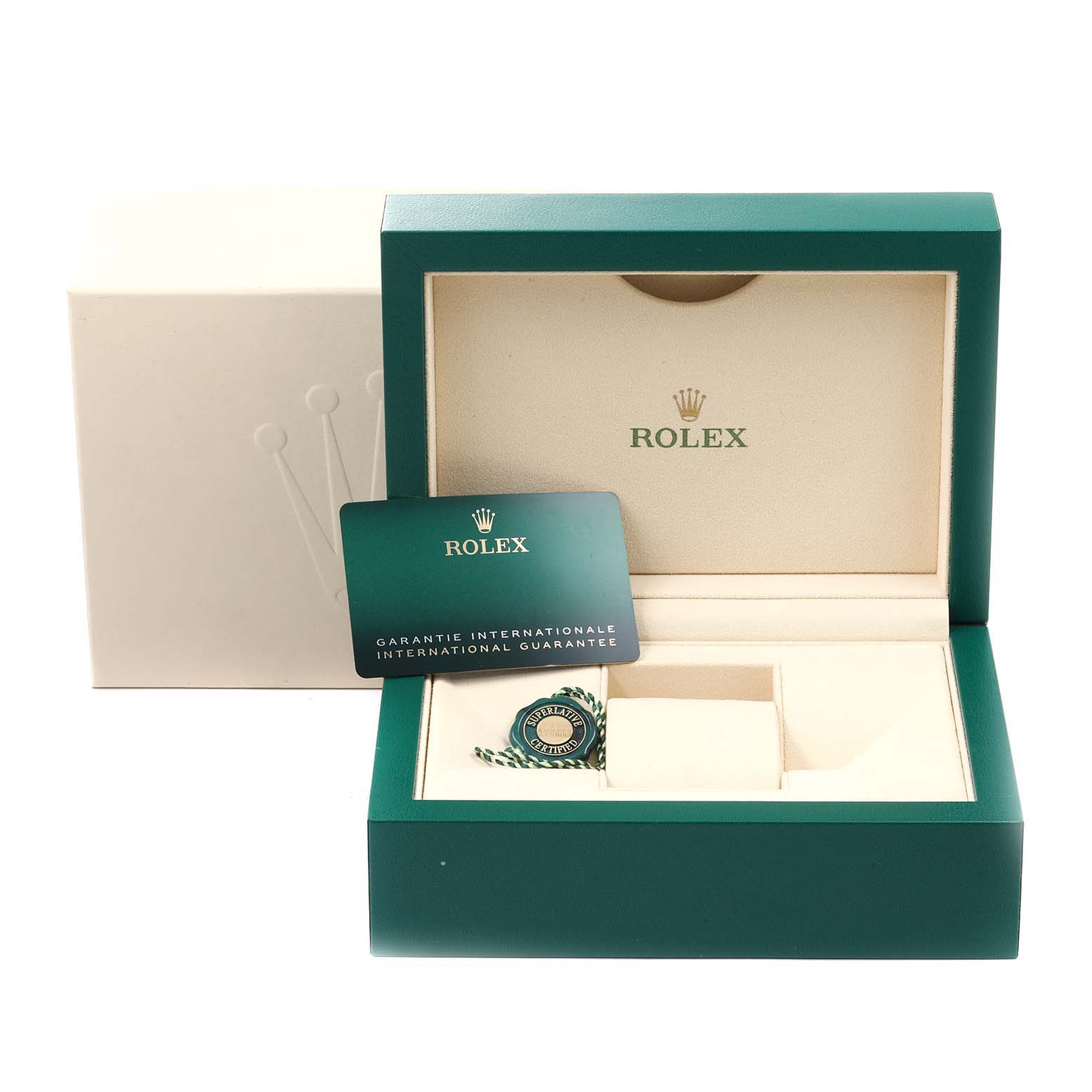 The image shows the open packaging, warranty card, and tag for a Rolex Explorer 214270 Men
s Stainless Steel Black Dial 214270 Men
s Stainless Steel Black Dial model watch.