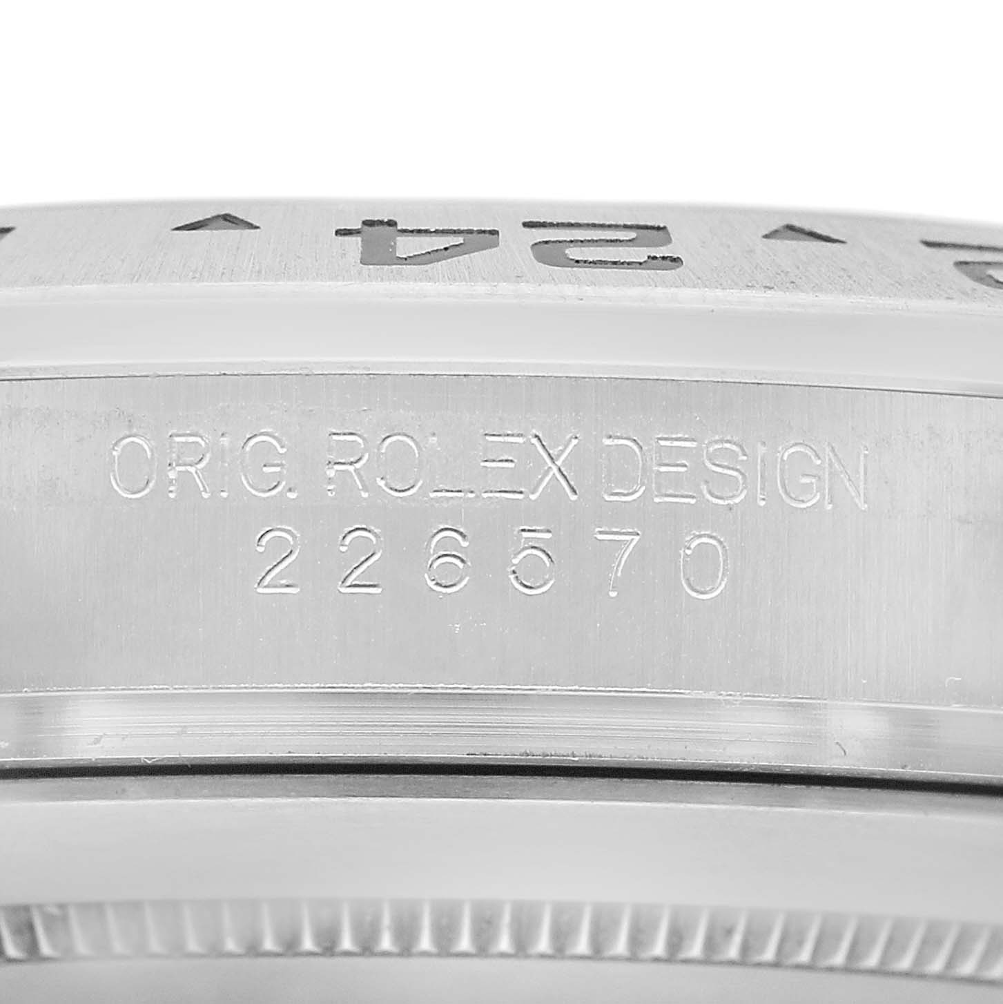 The image shows a close-up of the side of a Rolex Explorer 226570 Men's Stainless Steel White Dial watch case, displaying the engraved model number "226570".