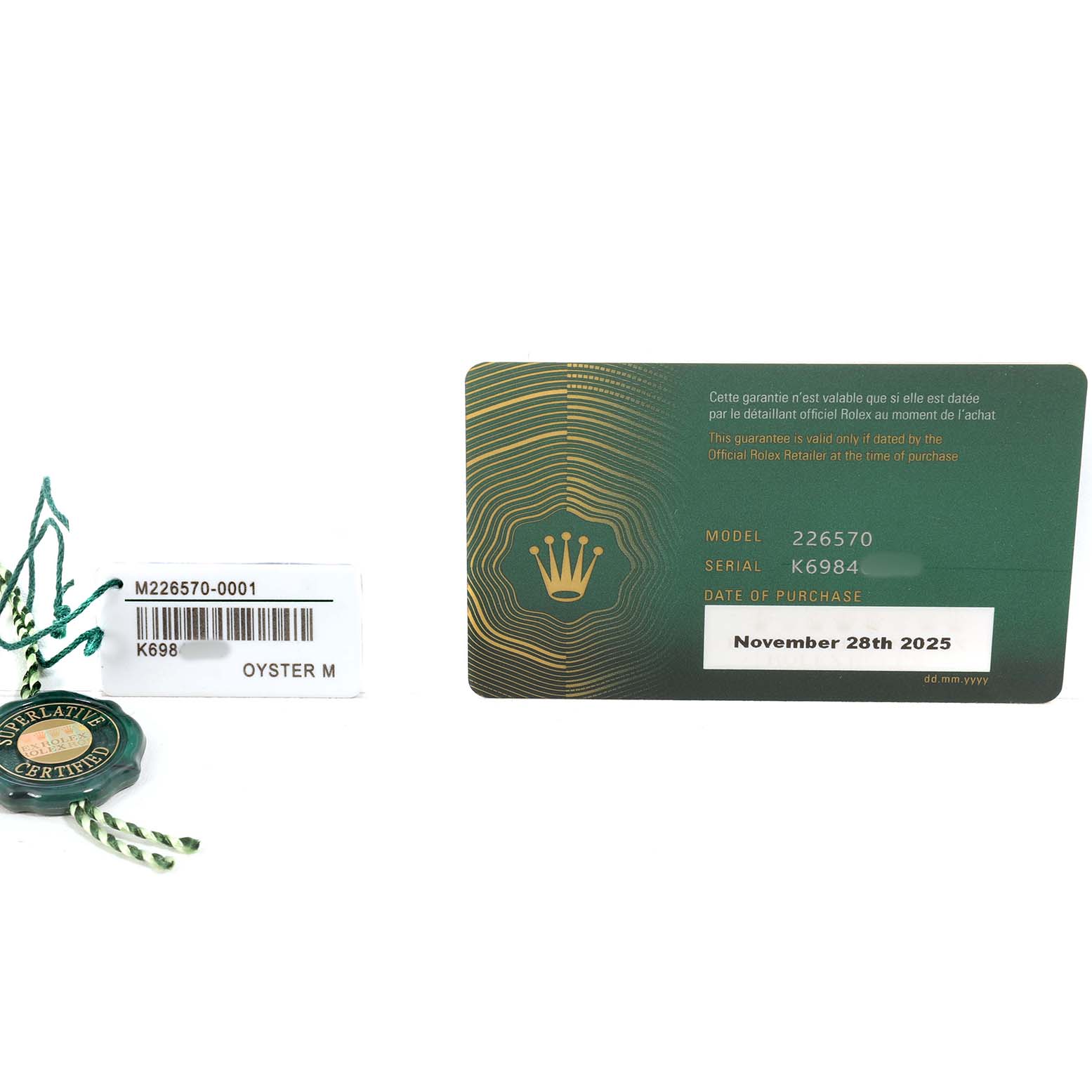 The image shows a warranty card and tag for the Rolex Explorer 226570 Men's Stainless Steel White Dial model, displaying model and serial numbers.
