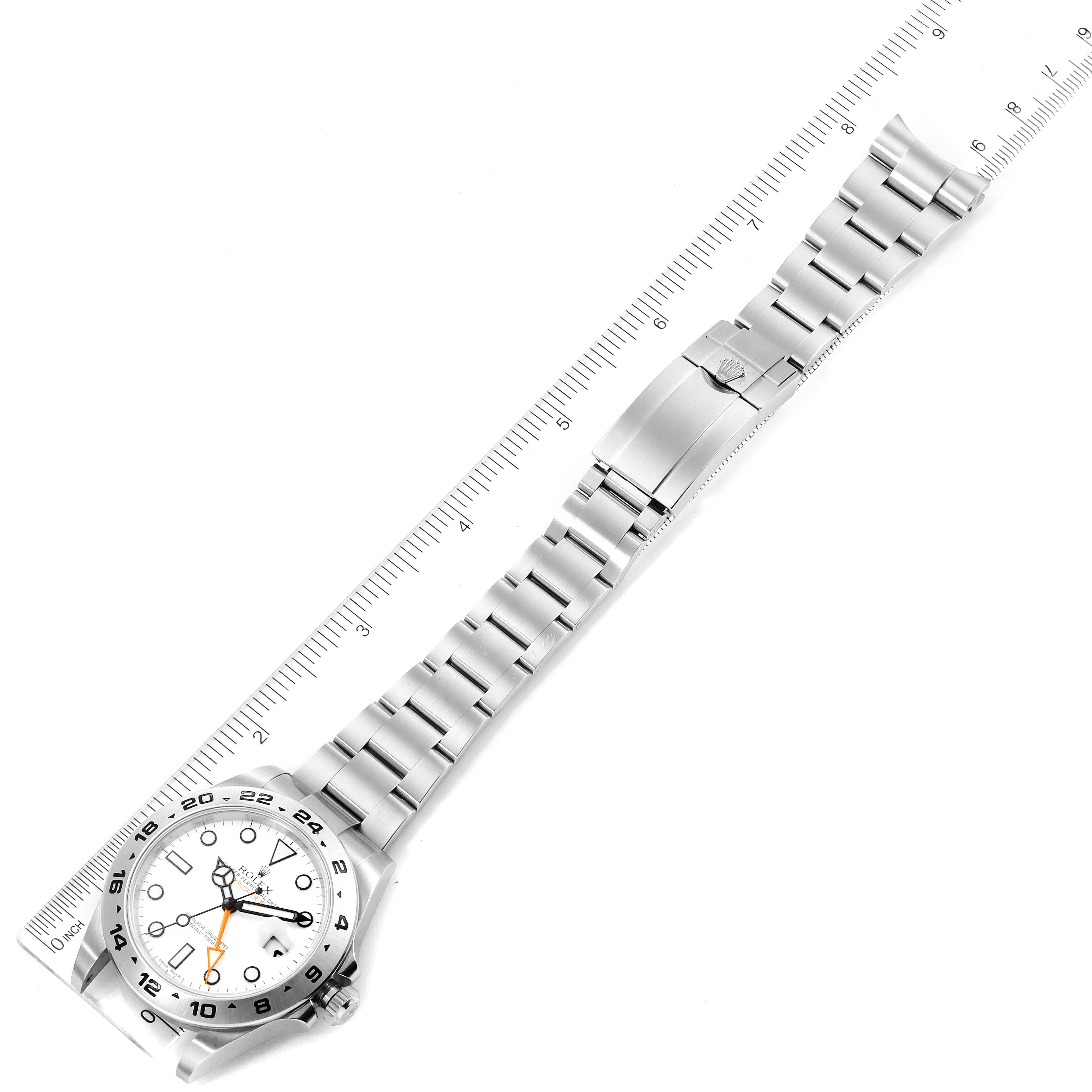 The image shows a top-down view of a Rolex Explorer 216570 Men
s Stainless Steel White Dial 216570 Men
s Stainless Steel White Dial watch, displaying the full band, clasp, and face of the watch.