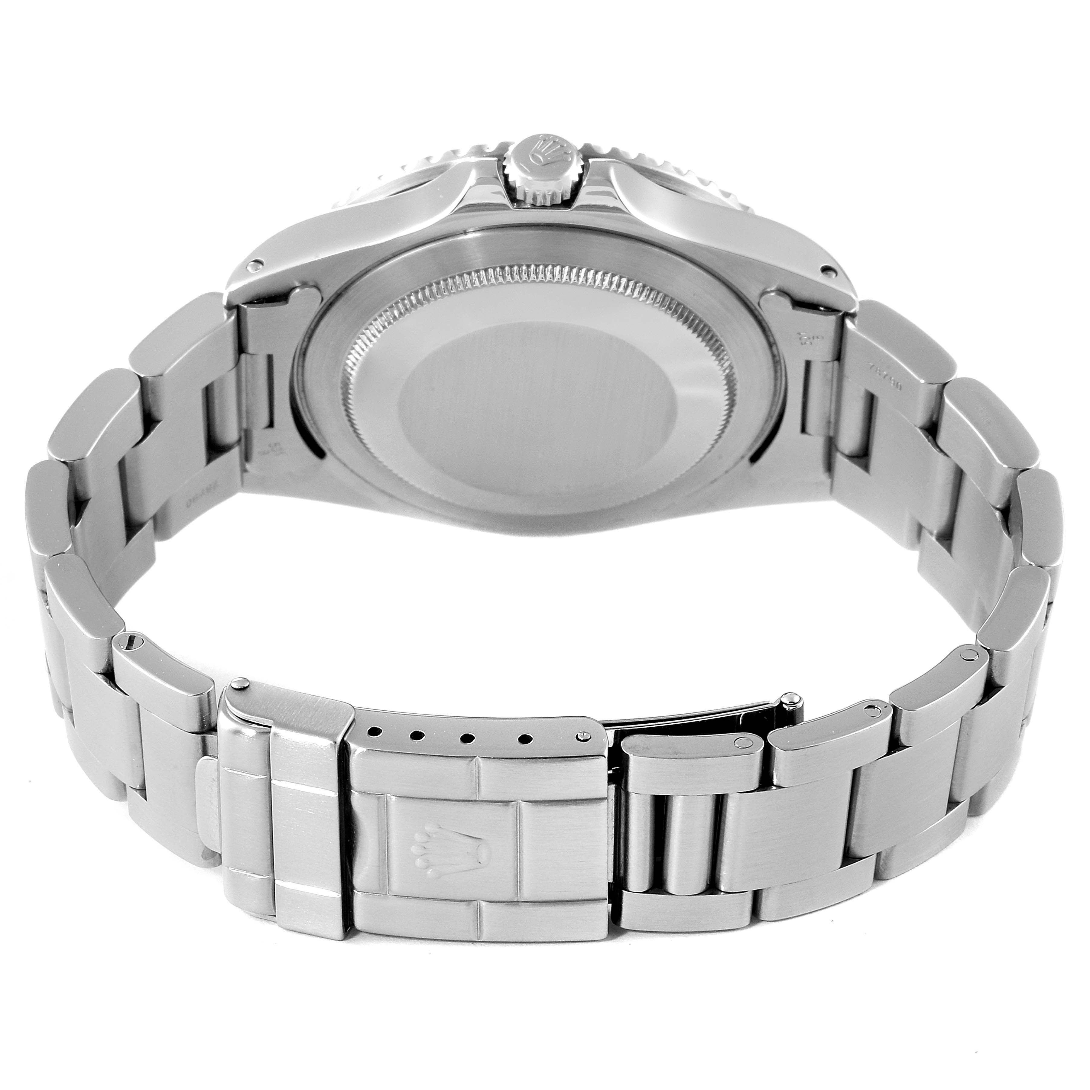 The image shows the back view of the Rolex GMT-Master 16700 Men
s Stainless Steel Black Dial 16700 Men
s Stainless Steel Black Dial watch, highlighting the case back, bracelet links, and clasp.