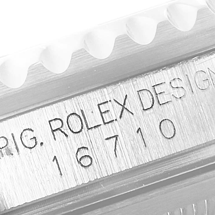 The image shows a close-up of the case side with model number "16710" engraved on the Rolex GMT-Master 16710 Men
s Stainless Steel Black Dial 16710 Men
s Stainless Steel Black Dial watch.