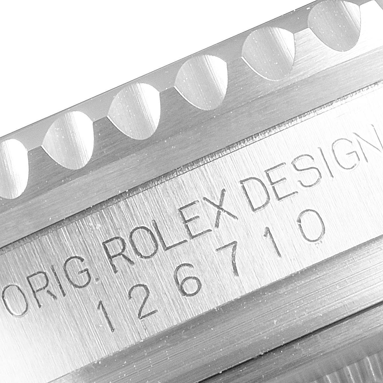 This image shows a close-up angle of the engraved case side of the Rolex GMT-Master 126710 Men
s Stainless Steel Black Dial 126710 Men
s Stainless Steel Black Dial, displaying the design number 126710.