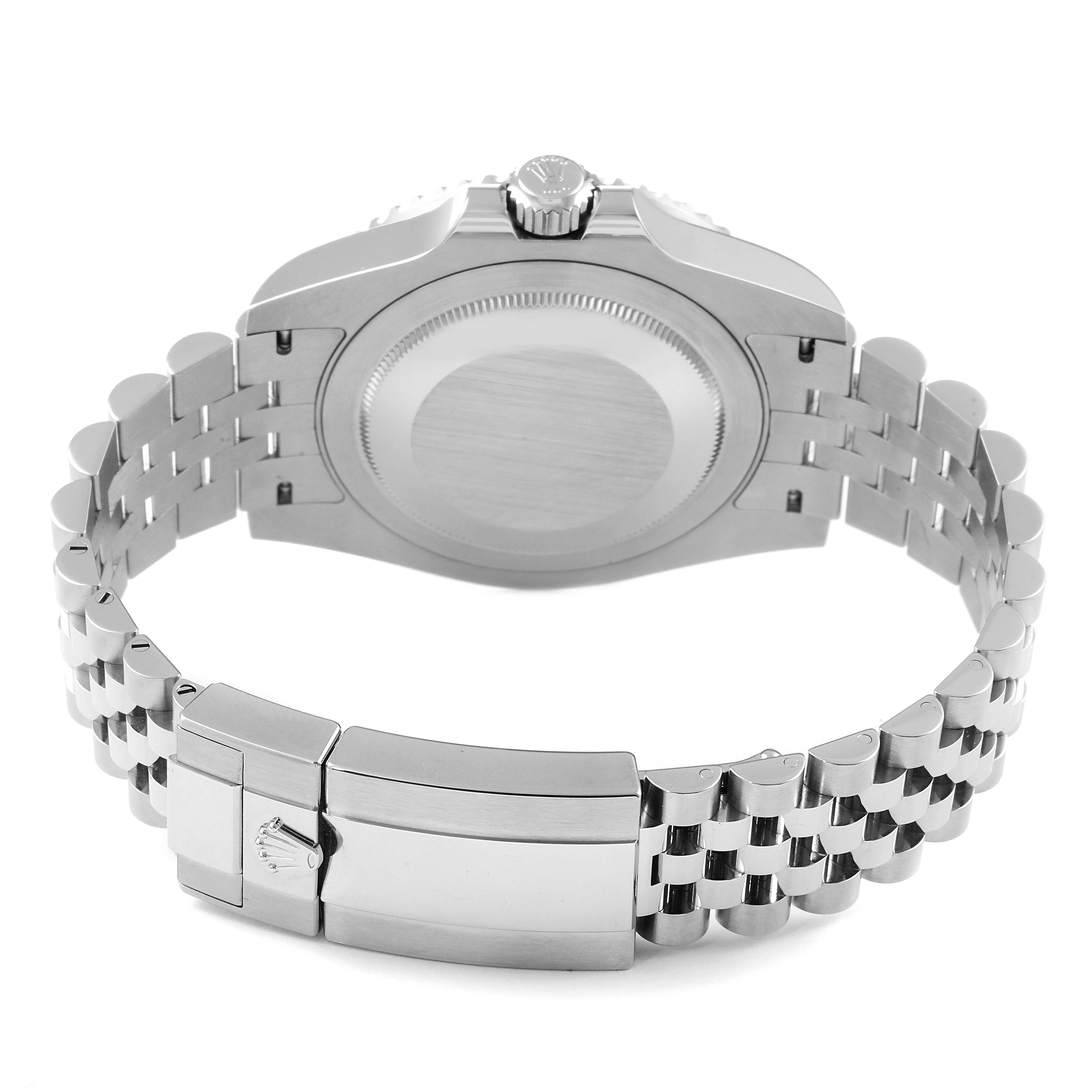 This image shows the back view of the Rolex GMT-Master 126710 Men
s Stainless Steel Black Dial 126710 Men
s Stainless Steel Black Dial watch case and metal bracelet with the clasp open.