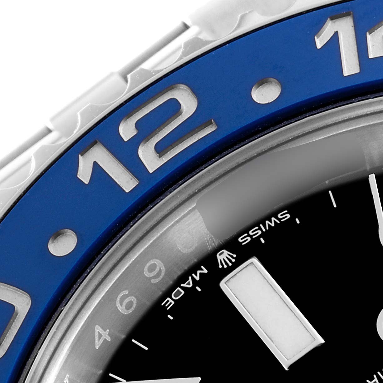 This close-up image of the Rolex GMT-Master 126710 Men
s Stainless Steel Black Dial 126710 Men
s Stainless Steel Black Dial watch highlights part of the blue bezel and a portion of the dial.