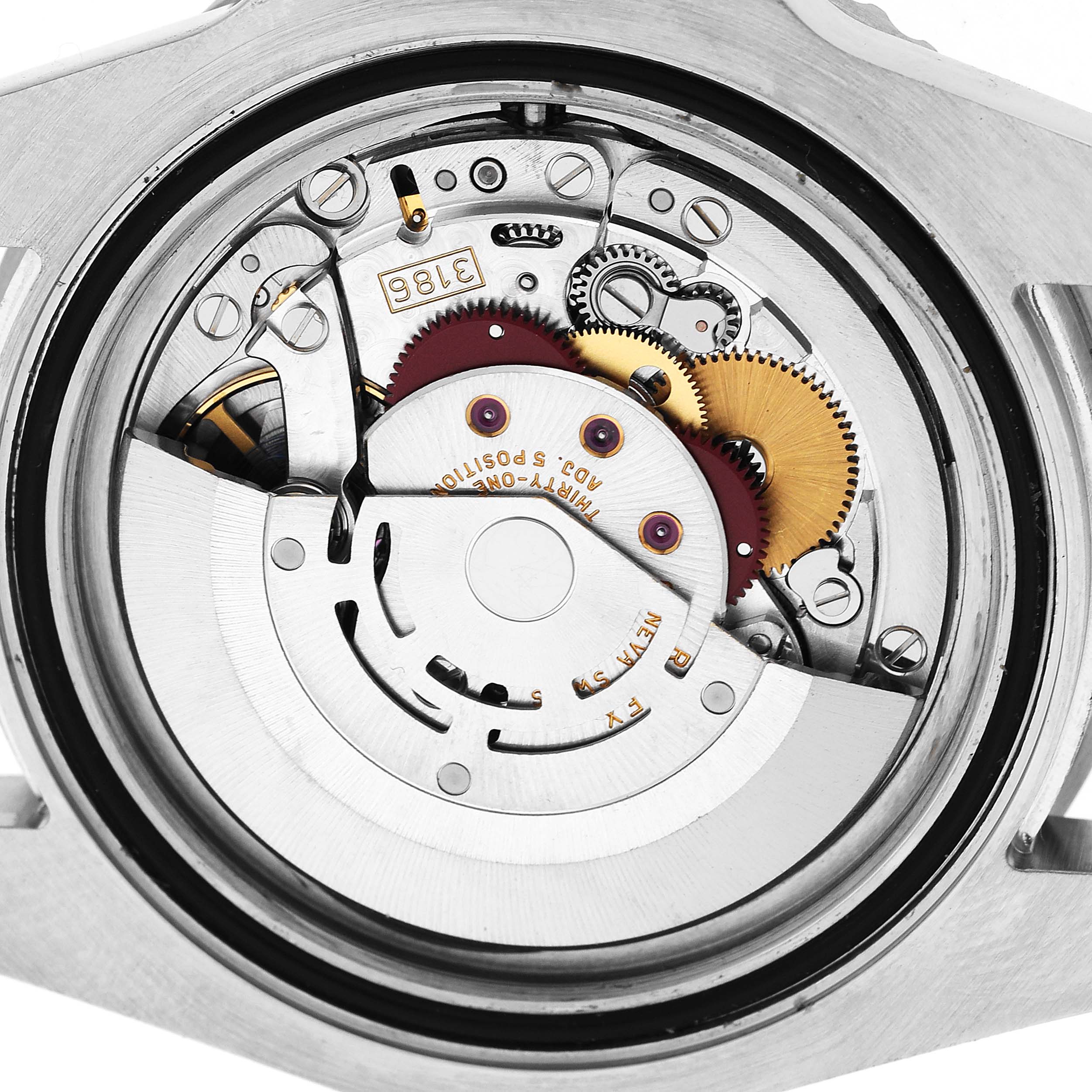 This image shows the movement of a Rolex GMT-Master 116710 Men's Stainless Steel Black Dial watch, highlighting gears and internal mechanisms from a back angle.