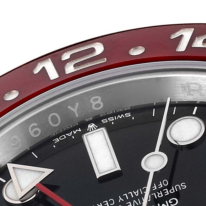 The image shows a close-up of the dial, bezel, and GMT hand of a Rolex GMT-Master 126710 Men's Stainless Steel Black Dial 126710 Men's Stainless Steel Black Dial watch.