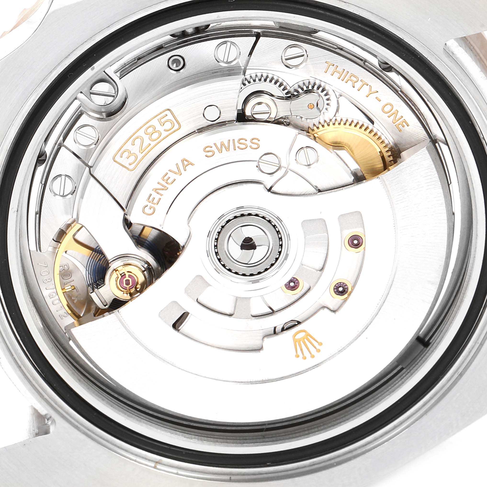 This image shows the backside of the Rolex GMT-Master 126711 Men's Steel and Gold (two tone) Black Dial 126711 Men's Steel and Gold (two tone) Black Dial model, revealing its intricate movement and internal components.