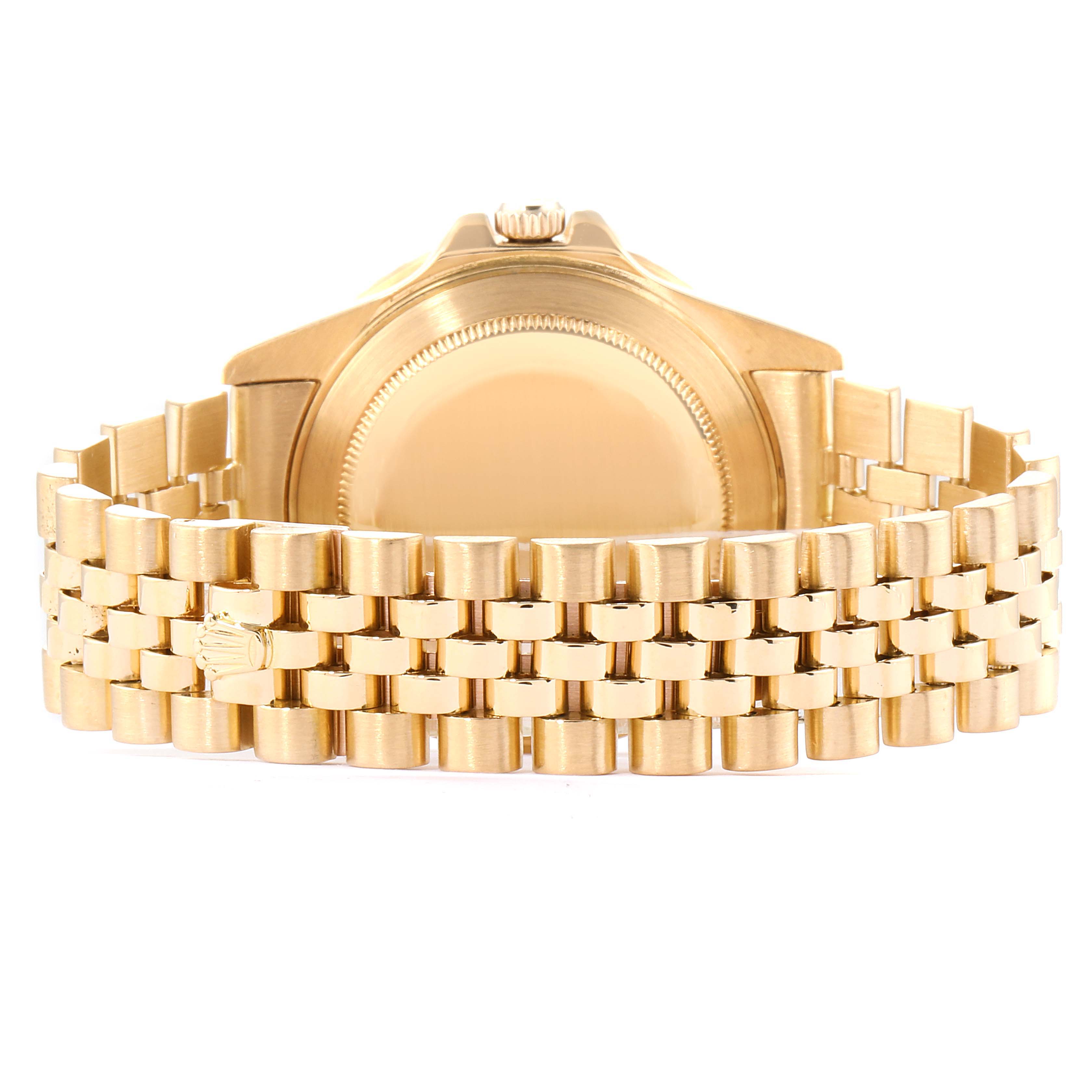 The image shows the back view of a gold Rolex GMT-Master 16758 Men's Yellow Gold Black Dial 16758 Men's Yellow Gold Black Dial watch, highlighting the case back and part of the bracelet.