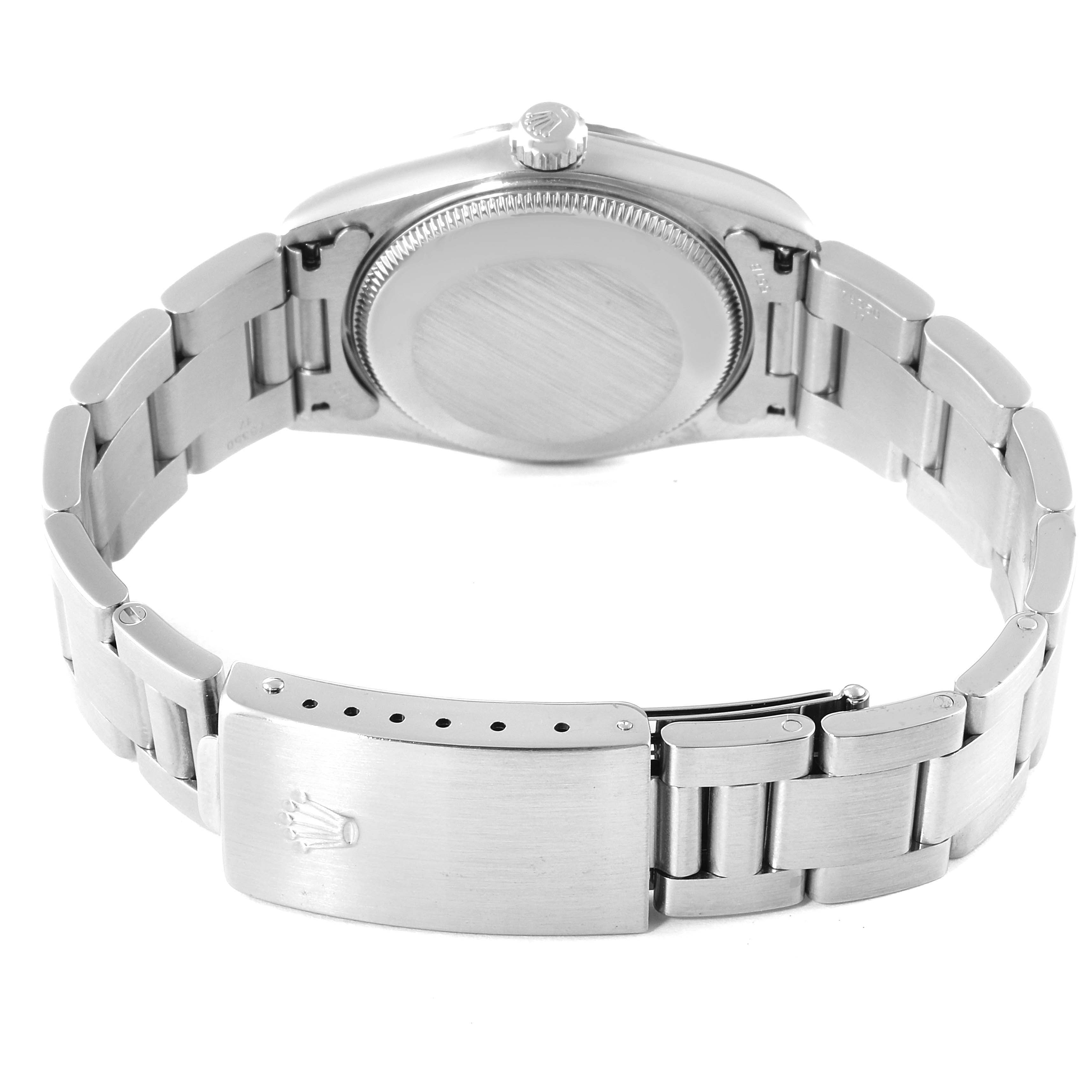 This image shows the back view and bracelet of a Rolex Mid-Size 77014 Women
s Stainless Steel Black Dial 77014 Women
s Stainless Steel Black Dial model watch.