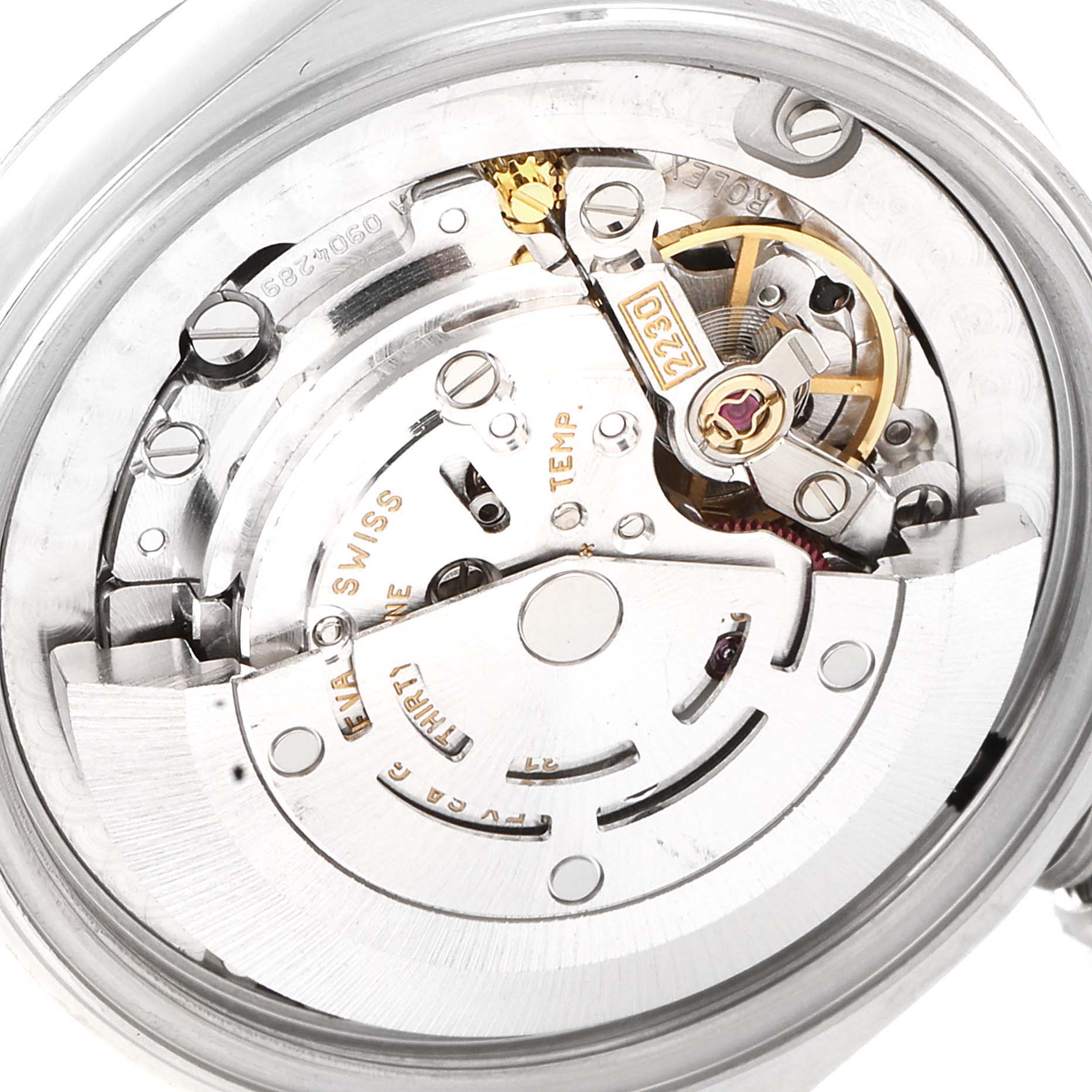 This image shows the movement and internal mechanism of a Rolex Mid-Size 77014 Women
s Stainless Steel Black Dial 77014 Women
s Stainless Steel Black Dial watch from a close-up angle.