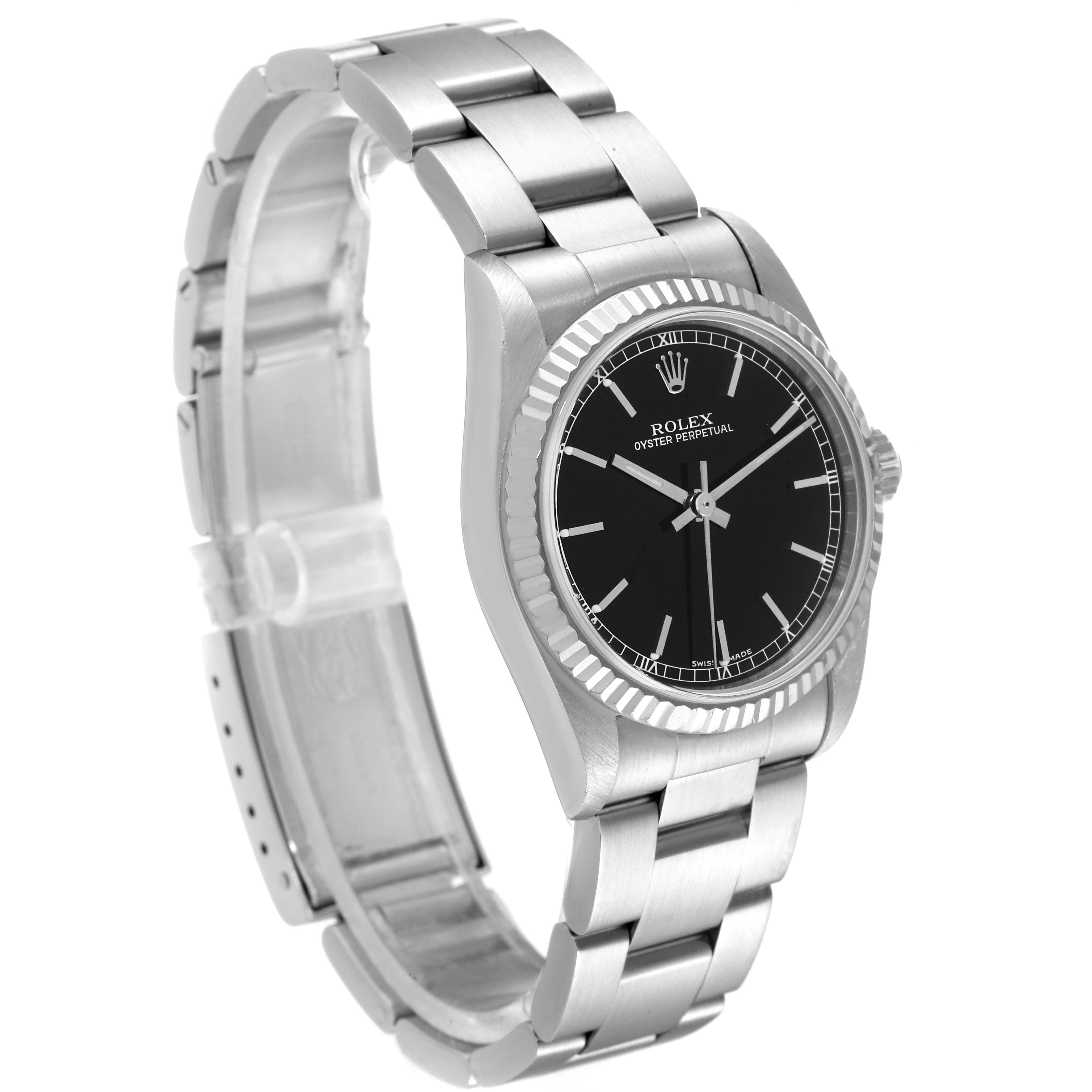The image shows a Mid-Size Rolex Oyster Perpetual watch at a three-quarter angle, highlighting the bracelet, case, and black dial.