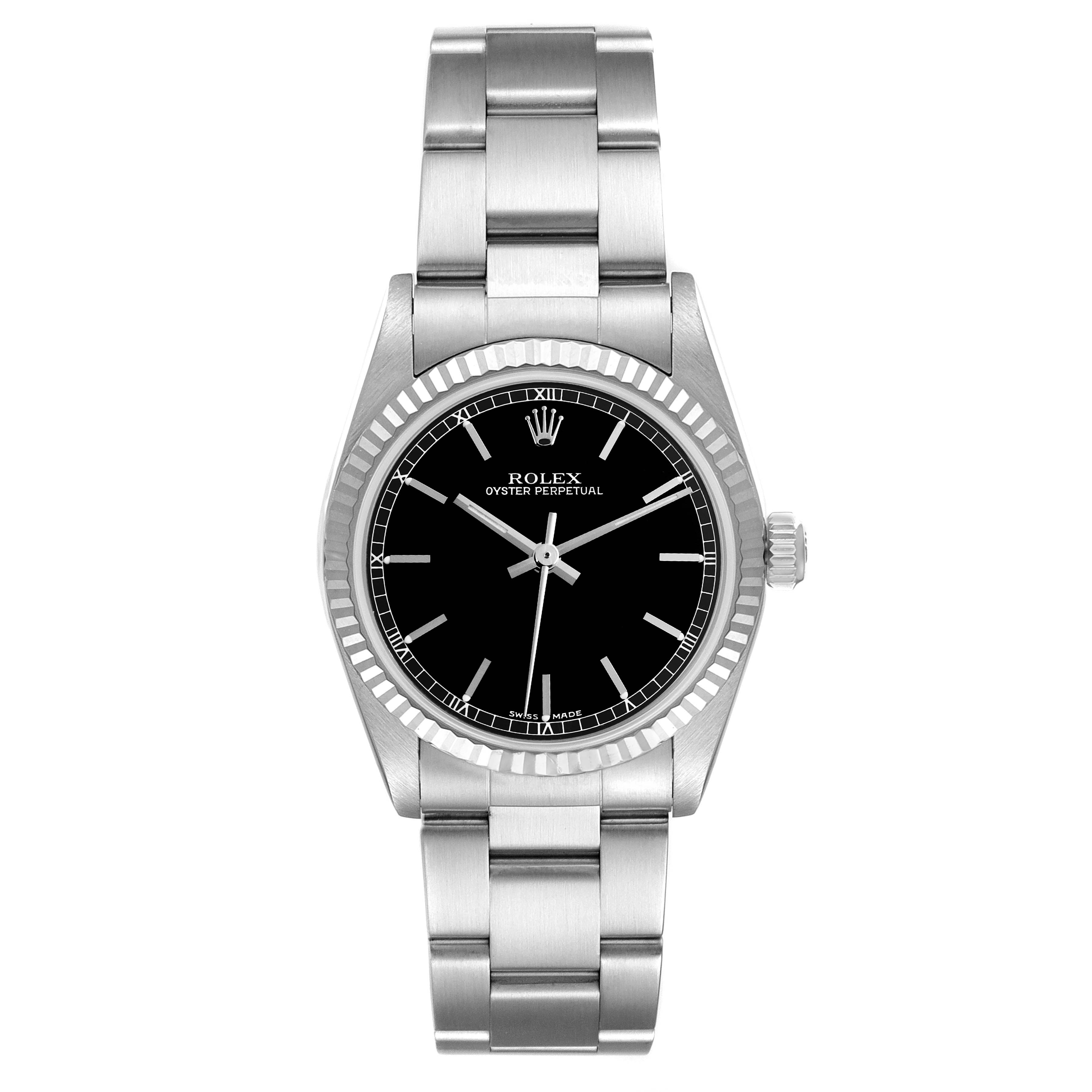 The image shows a head-on angle of a Rolex Mid-Size 77014 Women
s Stainless Steel Black Dial 77014 Women
s Stainless Steel Black Dial Oyster Perpetual watch, displaying its face, bezel, and band.