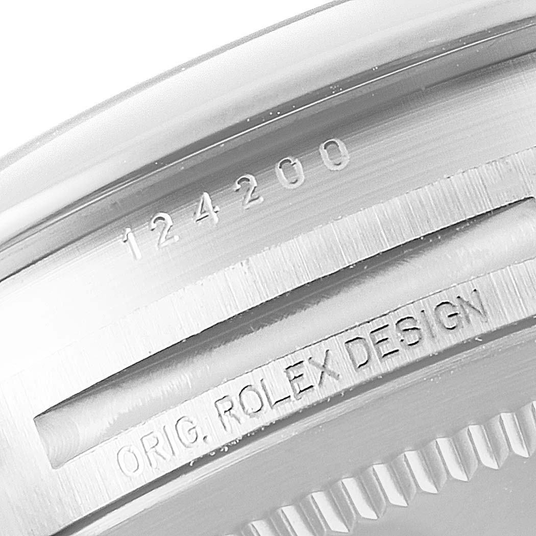 This image shows a close-up of the casing with model number of an Oyster Perpetual model by Rolex.