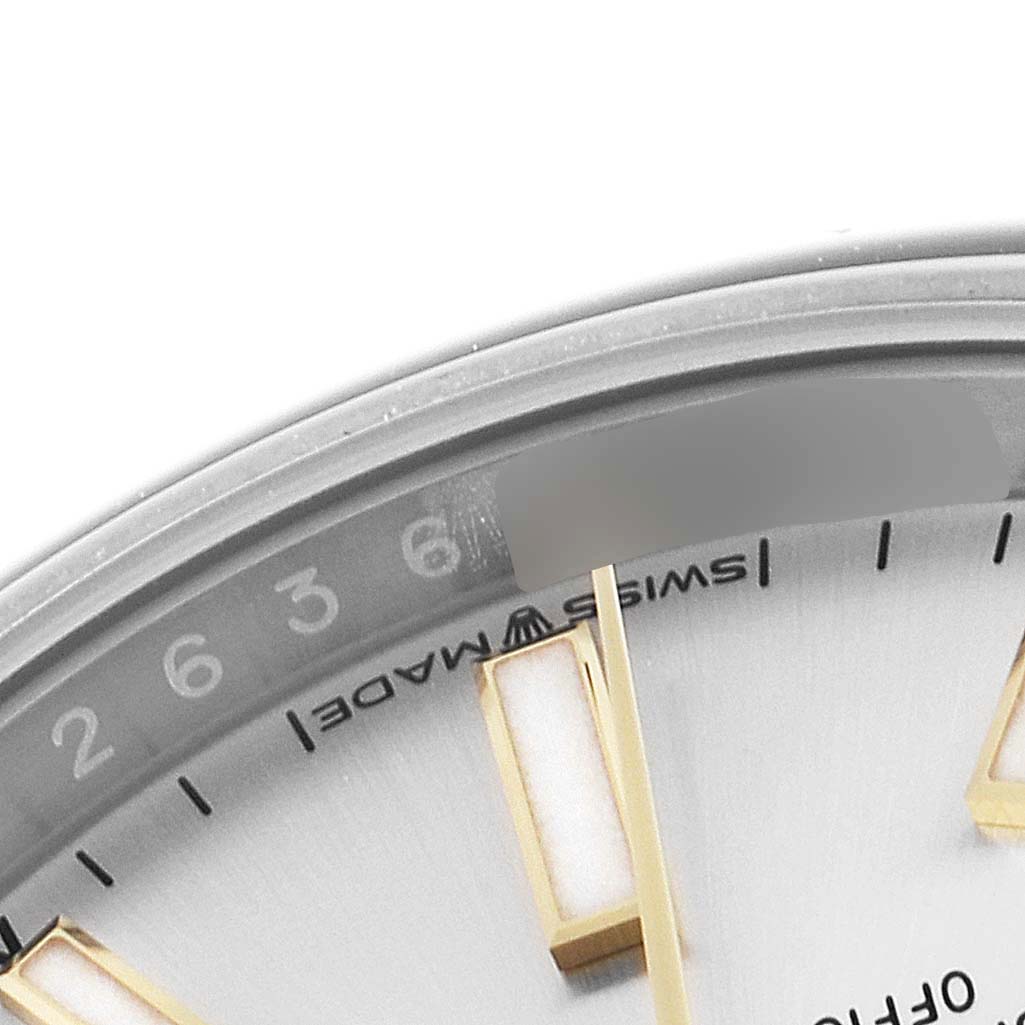 This image shows a close-up of the dial and bezel of a Rolex Oyster Perpetual 124200 Men's Stainless Steel Silver Dial 124200 Men's Stainless Steel Silver Dial watch, focusing on the minute markers and part of the second hand.