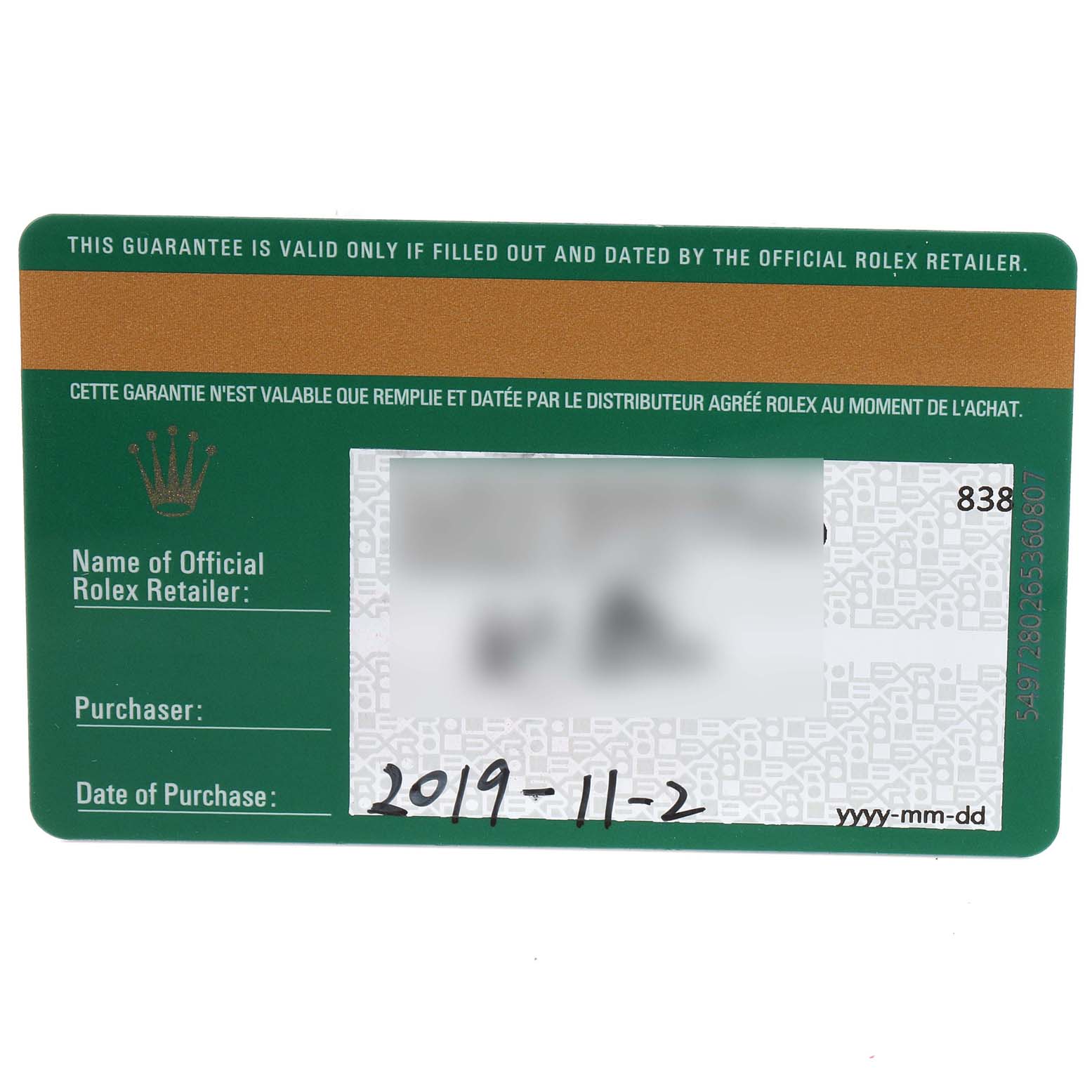 This image shows the official guarantee card for a Rolex Oyster Perpetual 114300 Men
s Stainless Steel Blue Dial 114300 Men
s Stainless Steel Blue Dial watch, displaying purchase details.