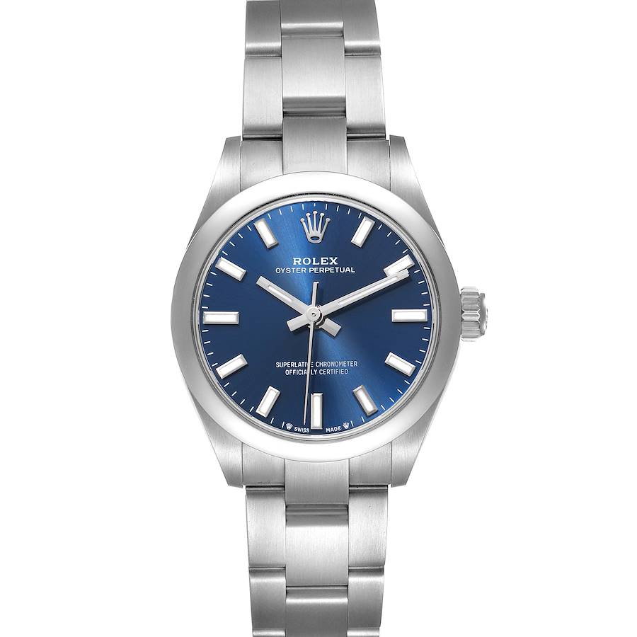 The Rolex Oyster Perpetual watch is shown from a front angle, highlighting its blue dial, markers, and steel bracelet.